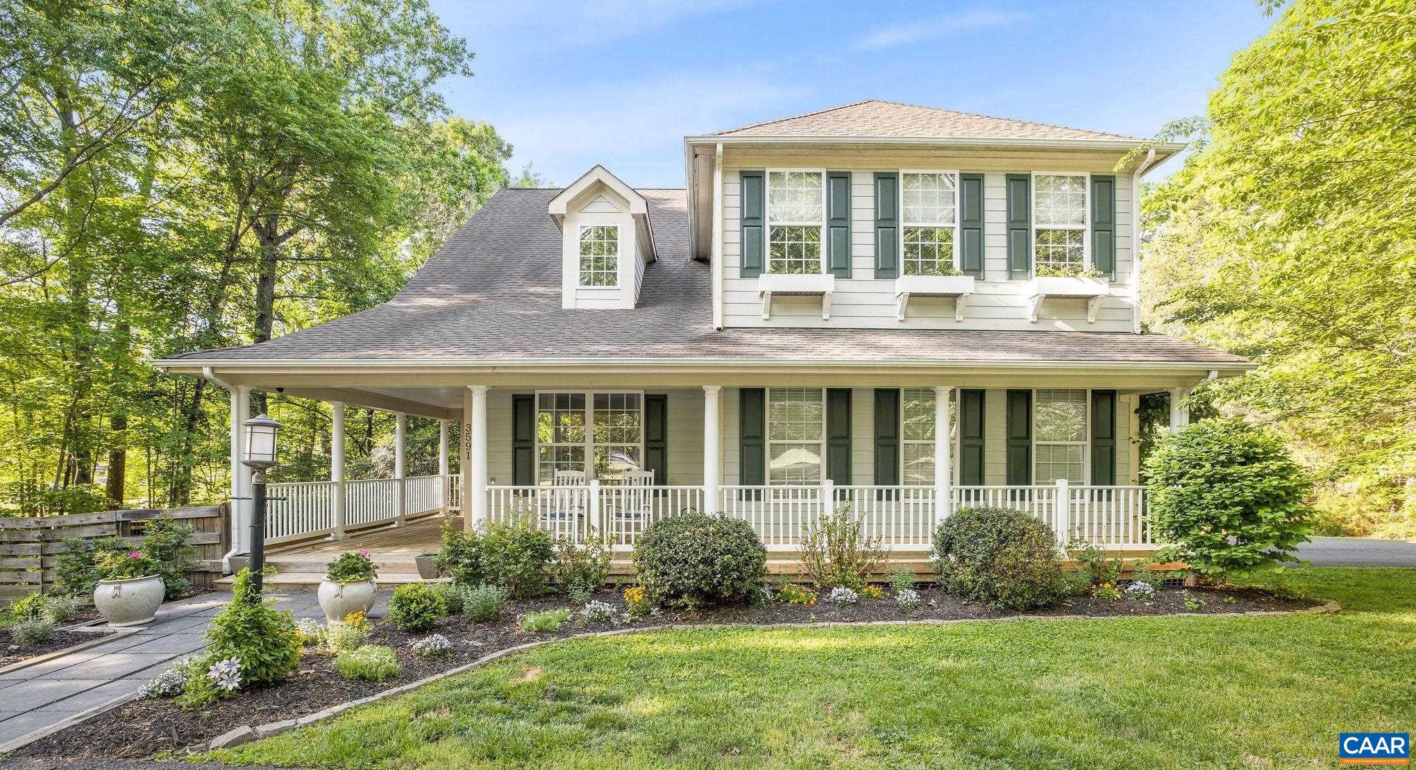 This cheerful Western Albemarle 5 bedroom was built by a respected local builder in 2003. The current owner has further improved the home with extensive recent renovations including a new kitchen and primary bath, as well as by adding a 5th bedroom/guest suite on the terrace level. The lower level features a playroom complete with built-in playhouse and slide. All appliances are 4 years old or younger (dishwasher is brand new) and there is new flooring on the 1st and 2nd floors. The floor plan is light, bright and open, with soaring ceilings on the 1st floor. The laundry room is conveniently located on the 2nd floor. Outdoor spaces include a wonderful covered rear porch, patio with pavers and a firepit. The 2nd floor HVAC system is new. Located about 10 minutes west of Barracks Road shopping and about 8 minutes to Ivy Elementary School.,Painted Cabinets,Solid Surface Counter,Fireplace in Family Room