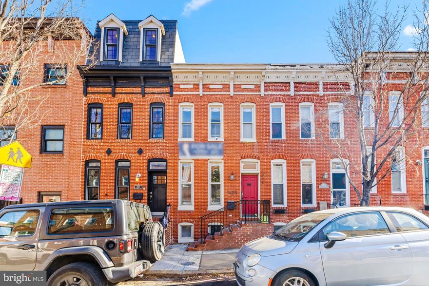 COMING SOON ON 11/14
Welcome to 1425 Covington St, a charming Federal Hill row home that perfectly blends character and modern amenities. This beautiful home offers two finished levels, with a spacious open floor plan on the main level, featuring exposed brick and a convenient half bath. The kitchen is a chef’s dream with SS appliances, ample cabinet and counter space. In the back you have a separate dining area that leads to the outside private deck, ideal for entertaining or enjoying your morning coffee. Upstairs, you’ll find two bedrooms, two bathrooms, and a well-appointed laundry area. The light-filled primary suite is a true retreat, complete with great closet space, built-ins, and an en-suite bath. The real highlight is the expansive rooftop deck, offering breathtaking views of the harbor, downtown, and the iconic Domino Sugar sign. It's the perfect spot to relax or entertain, especially for the annual 4th of July and New Year’s Eve fireworks shows!  Updates include  HVAC(2021), Hot water heater (2021), and sump pump(2021).  Don’t miss your chance to experience the best of the city living in one of Baltimore's most desirable neighborhoods.