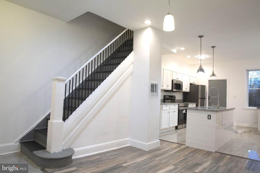 Welcome to your charming new abode in the heart of central Parks Heights, Baltimore! This newly renovated 3 bedroom, 2 bath home is the perfect blend of modern comfort and classic charm. With brand new flooring, lighting, and cabinetry, and so much more, this cozy home is an inviting oasis. Nestled adjacent to Pimlico Elementary School, convenience meets community in this thriving neighborhood. Don't miss out on the opportunity to make this lovely home yours!