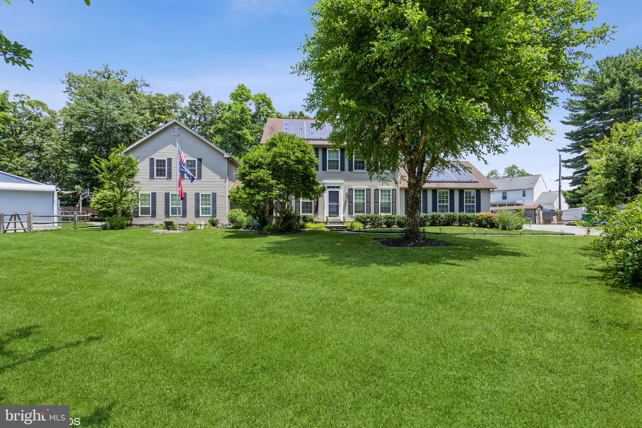 WOW, THIS EXPANSIVE COLONIAL IS TRULY A MUST SEE HOME SITUATED ON A .76 ACRE LOT! THE MAIN HOUSE HAS A LARGE DINING ROOM WITH WOOD FLOORS; MODERN KITCHEN WITH STAINLESS APPLIANCES & GRANITE COUNTERTOPS; HUGE LIVING ROOM WITH A PELLET STOVE; FAMILY ROOM WITH GAS FIREPLACE; LAUNDRY & FULL BATH. THE UPPER LEVEL HAS A SPACIOUS PRIMARY BEDROOM WITH WALK-IN CLOSET & EN-SUITE BATH; 3 ADDITIONAL GENEROUS-SIZED BEDROOM & HALL BATH. THE PARTIALLY FINISHED LOWER LEVEL HAS A REC ROOM; DEN & UTILITY ROOM WITH TONS OF STORAGE SPACE. THEN THERE IS THE FABULOUS 2-STORY IN-LAW OR GUEST HOUSE ADDITION! THE MAIN LEVEL OF THE ADDITION HAS A KITCHEN WITH AN ISLAND & STAINLESS APPLIANCES; BREAKFAST ROOM; LIVING ROOM; BEDROOM; FULL BATH & LAUNDRY ROOM. THE SECOND LEVEL HAS A FAMILY ROOM & PRIMARY BEDROOM WITH WALK-IN CLOSET & EN-SUITE BATH. RELAX OUTSIDE ON ONE OF THE DECKS OR SOAK IN THE HOT TUB! OVERSIZED 2-CAR ATTACHED GARAGE. THERE ARE 4 SHEDS INCLUDED ONE OF WHICH IS LARGE ENOUGH TO BE USED AS A BOAT SHED. THIS PROPERTY HAS IT ALL!