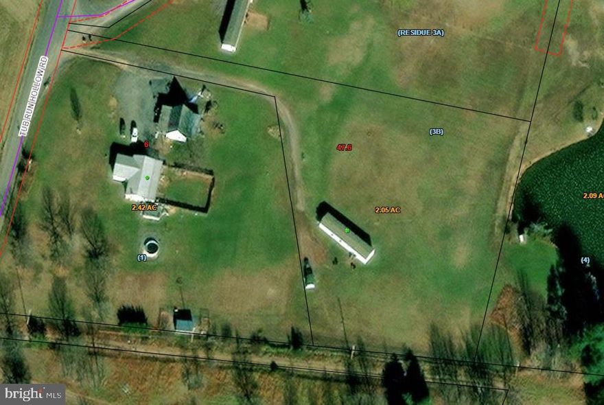 Single wide mobile home on 2 unrestricted acres with beautiful mountain views in Hedgesville, WV. Build your dream home while living on-site in comfort with 3 bedrooms and 2 bathrooms. Primary bedroom has a large soaking tub and plenty of storage. This home has everything you need to feel comfortable. Whether you plan on building in the future, or enjoying the simple life. Close enough to town to enjoy modern conveniences, but gives the feel of being "out in the country." Pond is not included with the property, but makes for a nice view.