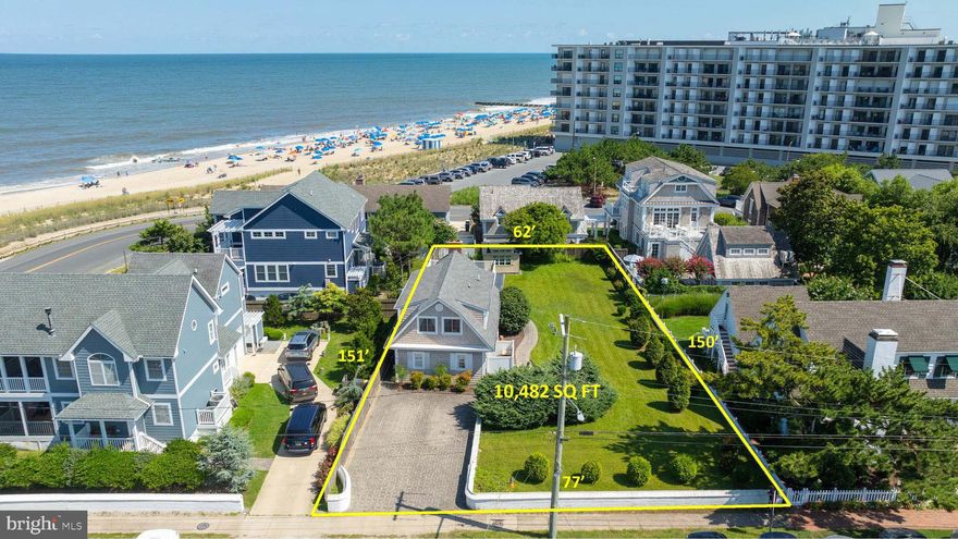 LEGACY PROPERTY    Presenting a rare and extraordinary opportunity to own one of Rehoboth Beach’s most significant properties — 4 Pennsylvania Avenue, an oversized 10,482 sq. ft. parcel just one house off the sand, positioned at the northern tip of the Rehoboth Beach Boardwalk.  Offering commanding views of the Atlantic Ocean and surf, this legacy property blends the charm of a beloved seaside retreat with the unmatched potential for a bespoke coastal estate.  Set on a lot measuring 77 x 150 x 62 x 150 over twice the size of a standard 50 x 100 Rehoboth parcel—this location allows for a range of expansion, architectural creativity, or total reinvention.  The current home offers 4 bedrooms, 2 full bathrooms, and approximately 1,800 sq. ft. of interior space, with unobstructed ocean views from multiple vantage points. From your doorstep, enjoy immediate access to the Rehoboth Beach boardwalk, pristine sands, and the rhythmic sound of waves just a few steps away.  A short stroll places you amid Rehoboth’s most celebrated amenities: award-winning dining, vibrant entertainment, boutique shopping, and the natural beauty of Cape Henlopen State Park, Gordon’s Pond and the Breakwater Junction Trail.  Whether you envision a grand coastal compound, a modern architectural statement, or wish to enjoy the existing home's classic charm, 4 Pennsylvania Avenue represents a once-in-a-generation opportunity to create something truly iconic in one of the East Coast’s most highly regarded beach communities.