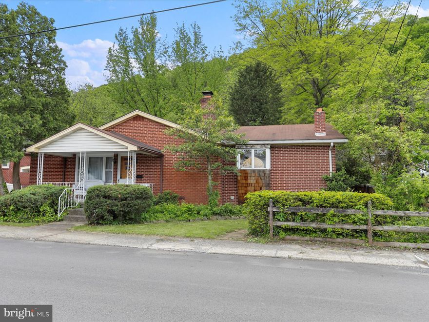 What's this?! An opportunity to own MORE THAN AN ACRE inside of Keyser?!  Chances like this are few and far between!  Not only is this beautiful brick rancher situated on more than an acre, but it's packed full of charm and character!  The features are endless on this one--from the THREE bathrooms, to the ornate fireplace, to the oversized 2 car garage.  And did I mention the HUGE closets off the bedrooms?