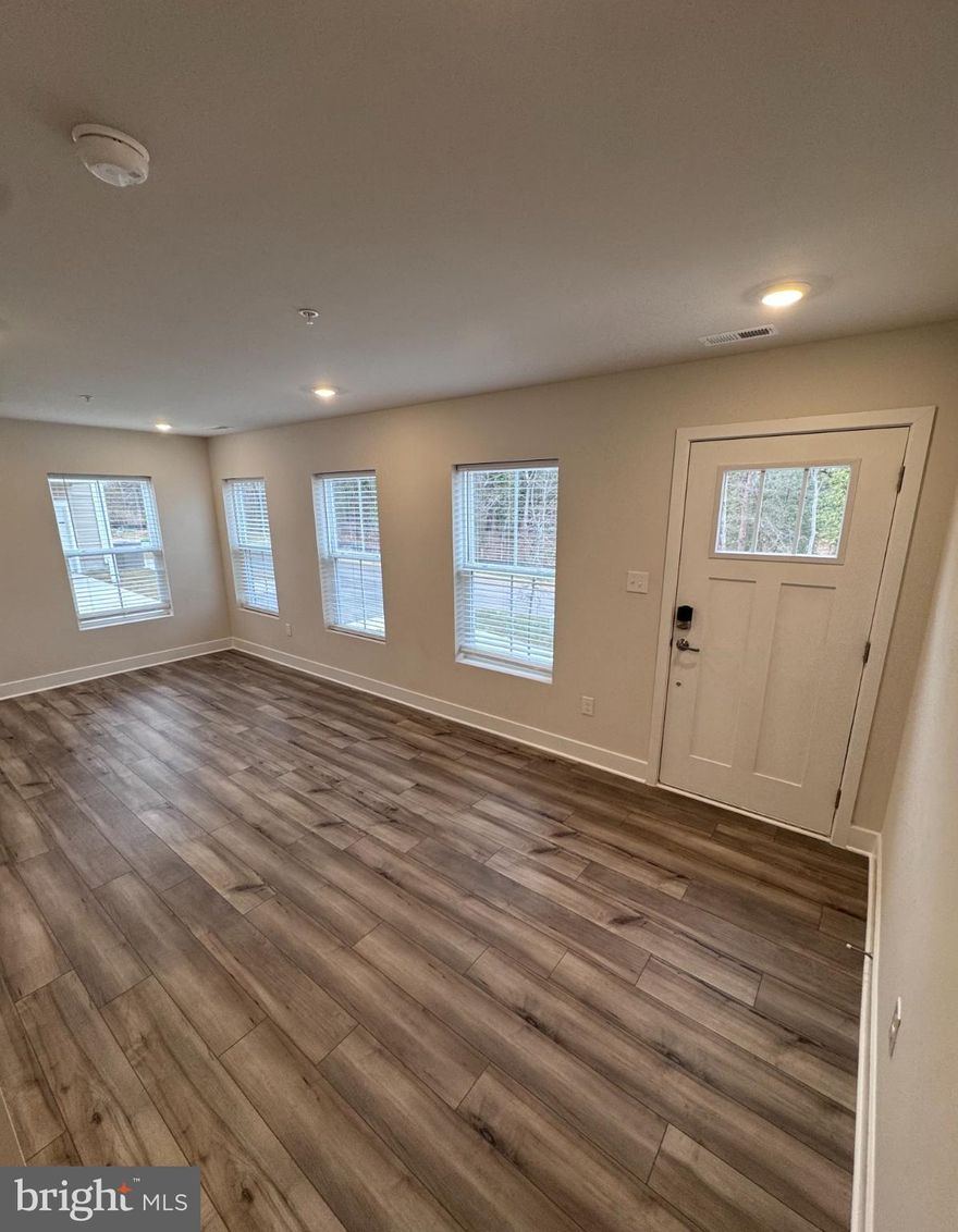 Experience unparalleled luxury in this exquisite new construction townhouse, completed in 2025. This stunning residence boasts 3 spacious bedrooms and 3.5 bathrooms, designed with an open floor plan that seamlessly connects the gourmet kitchen to the family and dining room, perfect for entertaining. Revel in high-end finishes, including luxury vinyl plank flooring, recessed lighting, and a sophisticated wet/dry bar with wine storage. The state-of-the-art kitchen features stainless steel appliances, a built-in microwave, and a gas range, catering to the culinary enthusiast. Enjoy the convenience of an upper-floor laundry and a tankless water heater, ensuring efficiency and comfort. There is an attached rear-entry, two car garage, and additional street parking available. This property includes grounds maintenance and trash removal. Come tour this beautiful townhome and experience all it has to offer! 

To apply visit https://www.longandfoster.com/ and click on the 'Rent' section at the top of the webpage, on the dropdown menu click on 'Long And Foster Rentals', type in the property address, and click on the property. Locate the 'Rental Application' button and follow the prompts to submit your application. 

Must meet the following financial and credit qualifications: Income Must Be 3X The Monthly Rent and Credit Score of 560 or Above.