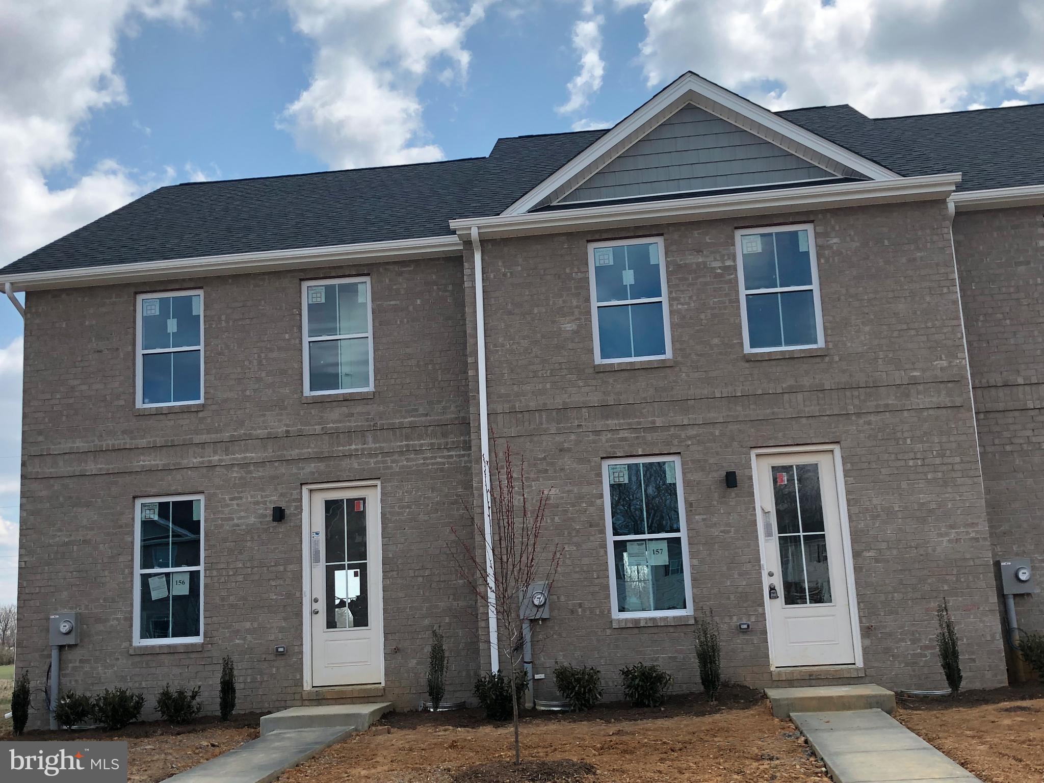 luxury Townhouse,all brick,Hardwood floor through out,2 bedrooms with 2 attached bathrooms and walk in closets,Washer & Dryer included. White kitchen with SS appliances.Family room open to kitchen with half bath.Concrete patio .Over 1350 sq ft of living area.One year lease for $1150 per month rent.Security deposit of $1000 required.NO PETS.