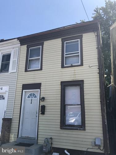 2 bedroom, 1 full bath house with laminate flooring throughout. Living/dining room combo, kitchen with stove & refrigerator. Laundry room with washer/dryer hookup and CAC. No pets. No smoking indoors.