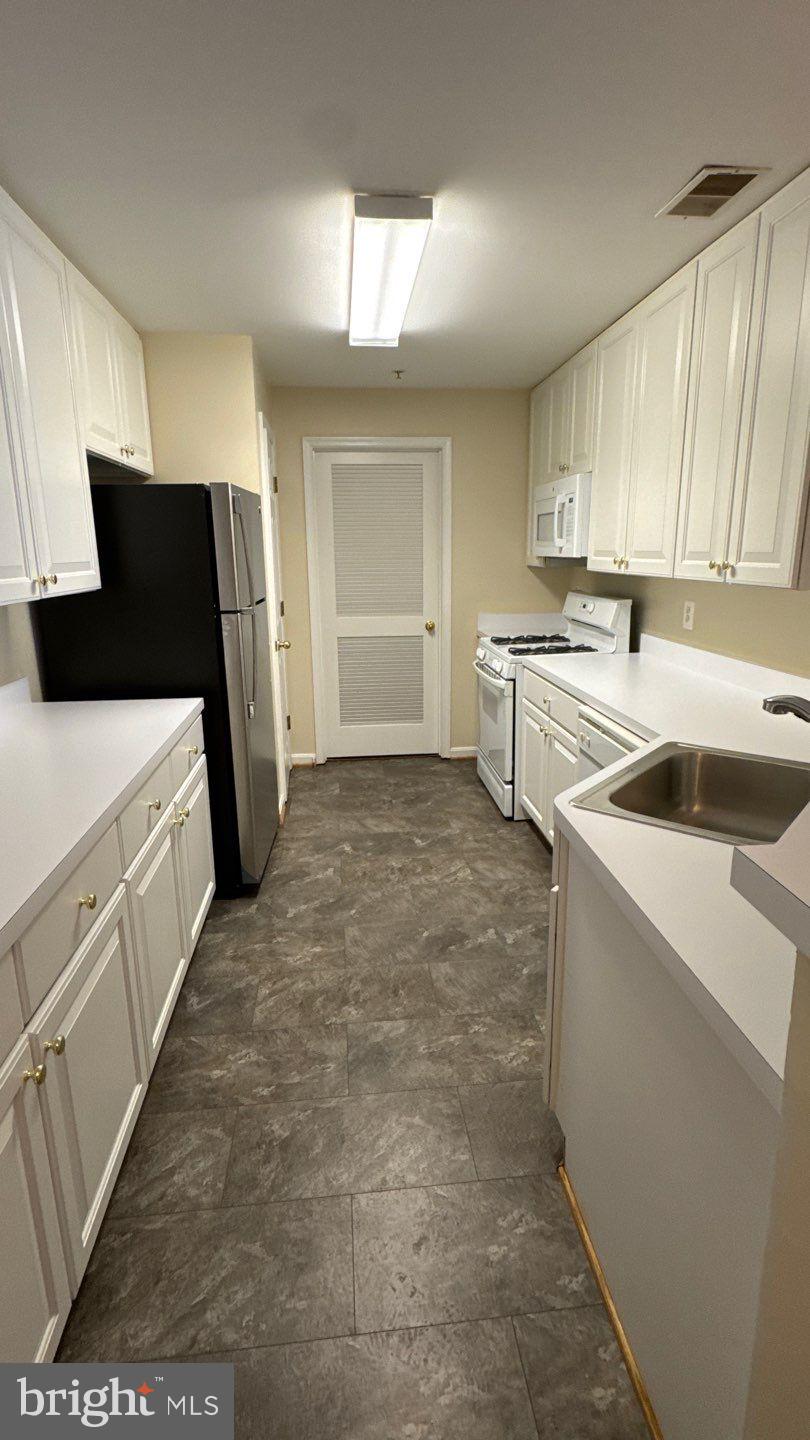 THE WHITNEY TOWN CENTER - Residential Lease