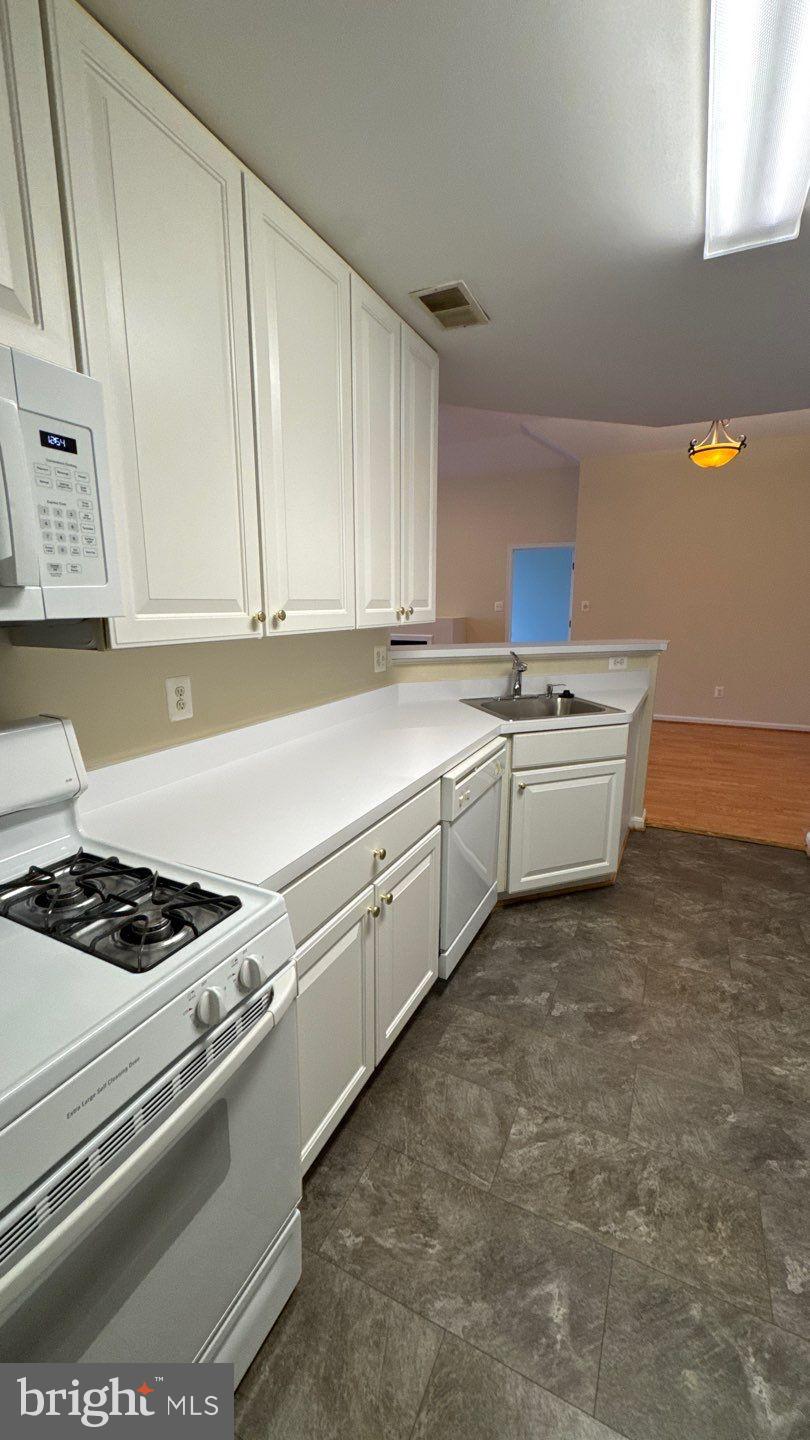 THE WHITNEY TOWN CENTER - Residential Lease