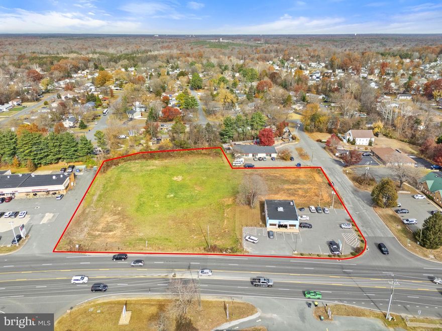 K I N G S L A N D   S Q U A R E – 2.926± AC RETAIL DEVELOPMENT SITE
Prime corner pad at the high-visibility intersection of Garrisonville Road (SR 610) and Kingsland Drive, Stafford, Virginia – one of the county’s most heavily traveled retail corridors.
LOCATION HIGHLIGHTS
• 52,000 VPD on Garrisonville Road (2024 VDOT) – dominant “going-home” side
• 1.5 miles from I-95 Exit 143B
• 3-mile demographics: 28,000+ population, $140,000+ average household income, 12,000+ daytime population driven by Quantico MCB
• Surrounded by Embrey Mill (1,000+ new homes), Hampton Inn, Chick-fil-A, Walmart, and new residential rooftops
SITE & ENTITLEMENTS
• Total acreage: 2.926± (Parcels 20-4 & 20C-2-195) – to be combined via approved boundary line adjustment
• Zoning: B-2 Urban Commercial (Highway Corridor Overlay District) – retail, restaurant, medical, office, bank, fitness, etc. by-right
• Major Site Plan approved 6/30/2014 for 15,000± SF multi-tenant retail center
• Conditional Use Permit R17-100 (2017) – drive-thru approved and vested (rare value-add in Stafford)
• VDOT entrance permit issued – full turning movements, no additional review required
• Underground stormwater management / BMP facility fully engineered and bonded
• Public water & sewer on site, 6" water line along Kingsland Drive, fire flow confirmed for commercial retail
• Existing 2,160 SF office/retail building (currently income-producing) is demolition-ready
PHYSICAL CONDITION
• Site is cleared, rough-graded, and shovel-ready
• Cullen Loam (CuB2) soils – low shrink-swell, excellent bearing capacity
• All off-site improvements (curb, gutter, sidewalk) pre-coordinated
MARKET FUNDAMENTALS
• Stafford retail vacancy: 2.5% (Q3 2025)
• Asking rents: $27–$33/SF NNN
• 24% YoY absorption increase in the submarket
• Rapidly growing trade area with limited entitled pads remaining
DELIVERY
Vertical construction can commence immediately upon ground lease execution or closing. Anticipated delivery Q3 2026.
USES
Perfect for QSR with drive-thru, convenience store/gas, bank, fitness, medical office, pharmacy, urgent care, coffee, or multi-tenant strip center.
OFFERING
Available for ground lease ($175,000–$225,000/year NNN) or outright sale. Full due-diligence package (site plans, approvals, geotech, underwriting report, traffic counts) available upon executed confidentiality agreement.
One of the last entitled, high-traffic corner pads in the Garrisonville Road corridor – an irreplaceable opportunity in one of Northern Virginia’s fastest-growing counties.