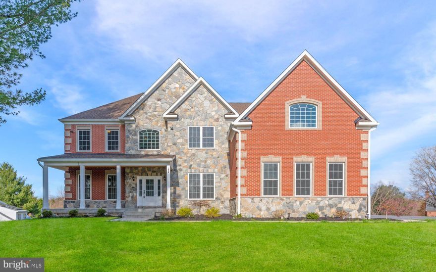 List price is Opening Bid At The Online Only Auction Sale.  Online auction to be conducted on Auctioneers website. Online registration & bidding begins Thursday, May 2nd and ends Tuesday,  May 7th at 11:00AM. The property is improved by a very spacious home with over 6,000 SF of living area, 6 Bedrooms, 5 Full Bathrooms, situated on a 2.48 acre lot. This spacious house welcomes you with a grand foyer showcasing stunning marble floors. The two-story Great Room occupies the center of the home and features a gas-fired fireplace and a wall of windows allowing ample natural light. There is also a formal Living Room, spacious Dining Room, eat-in Kitchen, Bedroom, a Full Bathroom and a Powder Room.  
For the culinary enthusiast, the eat-in kitchen is a dream come true. Luxurious granite countertops and tile floors provide a sleek and stylish backdrop, while the modern gas oven allows you to whip up delicious meals. Ample space for a dining table ensures meals can be enjoyed with loved ones. Adjacent to the kitchen, a formal dining room with marble floors adds a touch of elegance for special occasions. A convenient storage room keeps things organized, while the mudroom with closets is a practical entry point from the garage, keeping messes contained. The main level is completed by a half bathroom for added convenience. As you ascend the stairs, a long hallway with a view to the lower level adds a touch of grandeur. Gleaming wood floors grace the hallway, leading you to the luxurious master suite. This private retreat features a spacious bedroom with warm wood floors, a separate living area perfect for relaxation, and two walk-in closets to ensure everything has its place. The spa-like bathroom boasts a shower, a Jacuzzi tub, and double sinks for ultimate convenience. Three additional bedrooms with wood floors offer comfortable living space for family or guests. A laundry room is conveniently located on this level, while a floored attic provides extra storage for seasonal items or keepsakes. Two full bathrooms, one with double sinks, cater to the needs of those on this upper level. The partially finished basement offers additional living and entertaining areas. A large family room with a sink and cabinets is ideal for movie nights or game nights. Laminate wood floors add a touch of style and warmth to this space. A bonus room with laminate wood floors provides extra space for a home office, gym, or playroom, depending on your needs. An additional bedroom with laminate wood floors offers flexible living arrangements, even though it lacks a closet. A full bathroom ensures convenience on this level. An electric room, two electric meters, and a forced hot air system ensure the efficient operation of the house. Two sump pumps help prevent water accumulation in the basement, while an electric water heater provides hot water throughout the house. A fire sprinkler system adds an extra layer of safety for peace of mind. Moving outdoors, two A/C fans help circulate cool air throughout the house during warmer months. A spacious patio extends your living space to the outdoors, perfect for enjoying al fresco meals or relaxing evenings under the stars. The well-maintained yard surrounding the house provides ample space for barbecues, outdoor activities, or simply enjoying the fresh air. A long deck provides additional outdoor enjoyment, while a long driveway leads to a three-car garage, offering ample parking space for your vehicles. An additional parking space adds convenience for extra guests or a boat trailer. The house boasts a charming brick and stone front façade for a touch of timeless elegance that will surely impress. A welcoming front porch adds to the curb appeal, creating a warm and inviting first impression. Finally, a 500-gallon propane gas tank fuels the kitchen and fireplace, ensuring warmth and delicious meals for years to come. This home truly has it all.