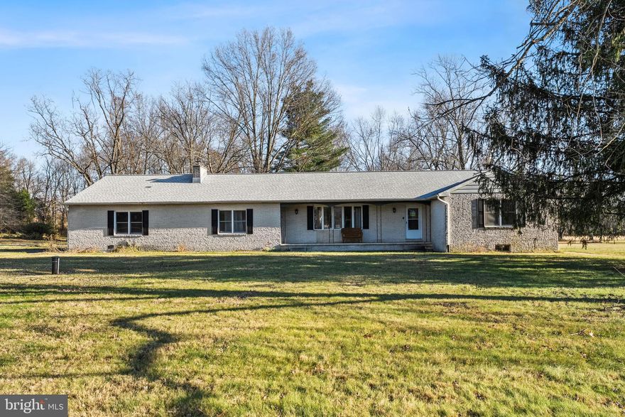 There’s a certain kind of property that feels like home the moment you arrive—where the land opens up, the air gets quieter, and everything in you exhales. 638 Appleton Rd is that place. Set on 2.14 sweeping acres across three parcels, this lovingly maintained 3-bedroom rancher offers the comfort of one-level living with the space, charm, and character that make a house feel truly lived in. Built in 1974 and cared for with pride, it carries a warmth that can’t be replicated—original details, sunlit rooms, and a sense of timeless ease that welcomes you in. Inside, the home unfolds with a generous flow. Two distinct living spaces create natural gathering areas: one centered around a classic fireplace perfect for winter evenings, the other wrapped in natural light from a wide bay window framing the changing seasons outside. The traditional layout blends coziness with openness, featuring a large kitchen with rich espresso cabinetry, and a separate formal dining room that glows with soft natural sunlight. A private office sits tucked away for remote work, creative pursuits, or quiet reflection. The sunroom opens to the outdoors, inviting morning coffee, summer breezes, and effortless indoor-outdoor living. Below it all lies one of the home’s greatest gifts: a full basement spanning the entire footprint of the house—immaculate, dry, and brimming with possibility. Whether you envision an entertainment retreat, an in-law suite, a workshop, or abundant storage, the space is ready for your imagination. Plumbing access even opens the door to a future second bathroom. For car lovers, hobbyists, or anyone seeking extra space, the property includes both an attached 2-car garage and an impressively large detached garage that can transform into a workshop, studio, storage space, or a haven for project-driven dreams. Outdoors, the land is a rare blend of openness and privacy. Portions are fenced, perfect for pets or kids, while the remaining acreage stretches into peaceful, usable space—ideal for gardening, small farmette aspirations, or simply enjoying the quiet rhythm of rural living. Neighbors feel distant, yet convenience is comfortably within reach. Located along the scenic, quiet stretch of Appleton Road, the home sits minutes from Fair Hill’s thousands of protected acres—Maryland 5 Star events, endless hiking trails, wildlife, and year-round outdoor adventure. A short drive takes you into Pennsylvania, Delaware, or the heart of Elkton for schools, dining, shopping, and everyday needs. For those seeking a simpler, more grounded lifestyle—or a home with land, character, and room to grow—638 Appleton Rd is a rare find. Not just a place to live, but a place to belong.