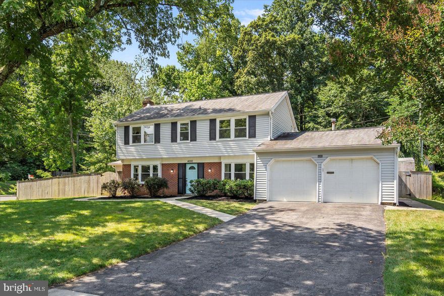 Welcome to 4000 Welsley Lane, a beautifully updated colonial in Bowie, MD. 

Inside, you will find a generous layout featuring six bedrooms, including a convenient main floor bedroom and a versatile in-law suite. With three and a half bathrooms, this home effortlessly accommodates both family and guests. The main living area spans over 2,500 square feet, providing plenty of room for relaxation and entertainment. 

The home's interior boasts modern updates, highlighted by a kitchen equipped with sleek stainless steel appliances. Classic charm is maintained with features such as a cozy fireplace, ensuring comfort and style throughout. Enjoy additional living space in the sunroom, which offers a bright and airy retreat.

This spacious home sits on a generous half-acre corner lot. The large fenced backyard is ideal for hosting gatherings, making it a perfect setting for both relaxation and entertainment. Featuring a two-car garage with a dedicated workroom, this property offers ample storage and convenience.

Conveniently located near major routes including Route 50 and 295, this property offers easy access to surrounding areas. Just a short drive from Bowie State University, Bowie Golf Course, and a variety of shopping and dining destinations.