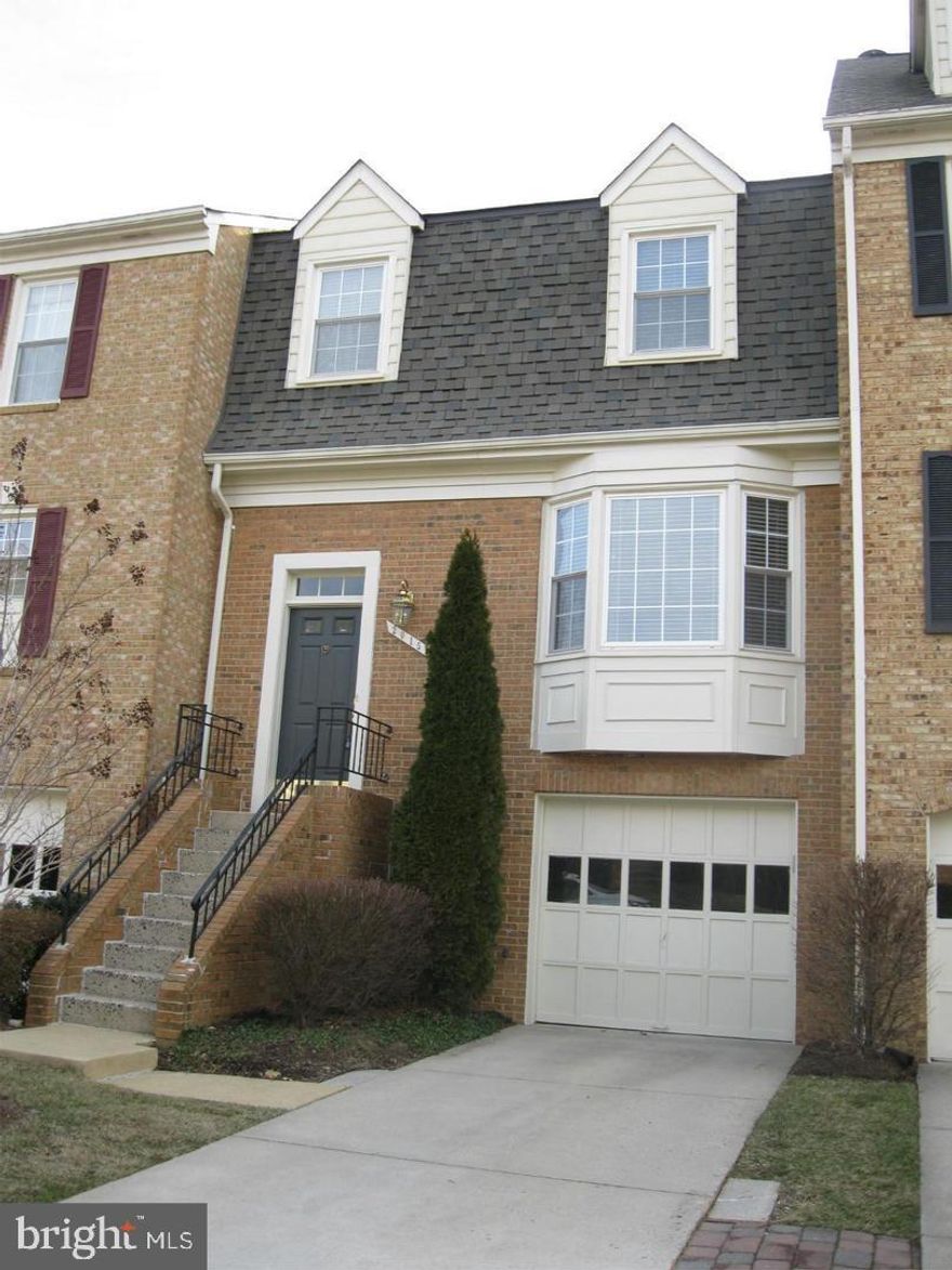 Beautiful well maintained three level and one car garage townhouse in the heart of Tyson’s Corner.  Gleaming hardwood flooring throughout the property. Main level features open living room with lots of natural light, formal dining room, gourmet kitchen with granite counter tops, plenty of cabinetry, stainless steel appliances, breakfast nook and main level powder room. Upper level boasts hardwood floors, two bedrooms with full bathroom to share, spacious master bedroom with vaulted ceiling, walk-in closet with plenty of storage space, dual sinks in bathroom. A fully finished walkout lower level includes a recreation room with gas fireplace, half bath and direct access to the fully fenced yard. New window blinds and HVAC .  Just minutes to Tyson Corner Mall, W&O Trail, Mosaic shopping district. Commuting is easy with quick access to I-495, Route 66, Dulles Toll Road, Silver and Orange Metro Station.