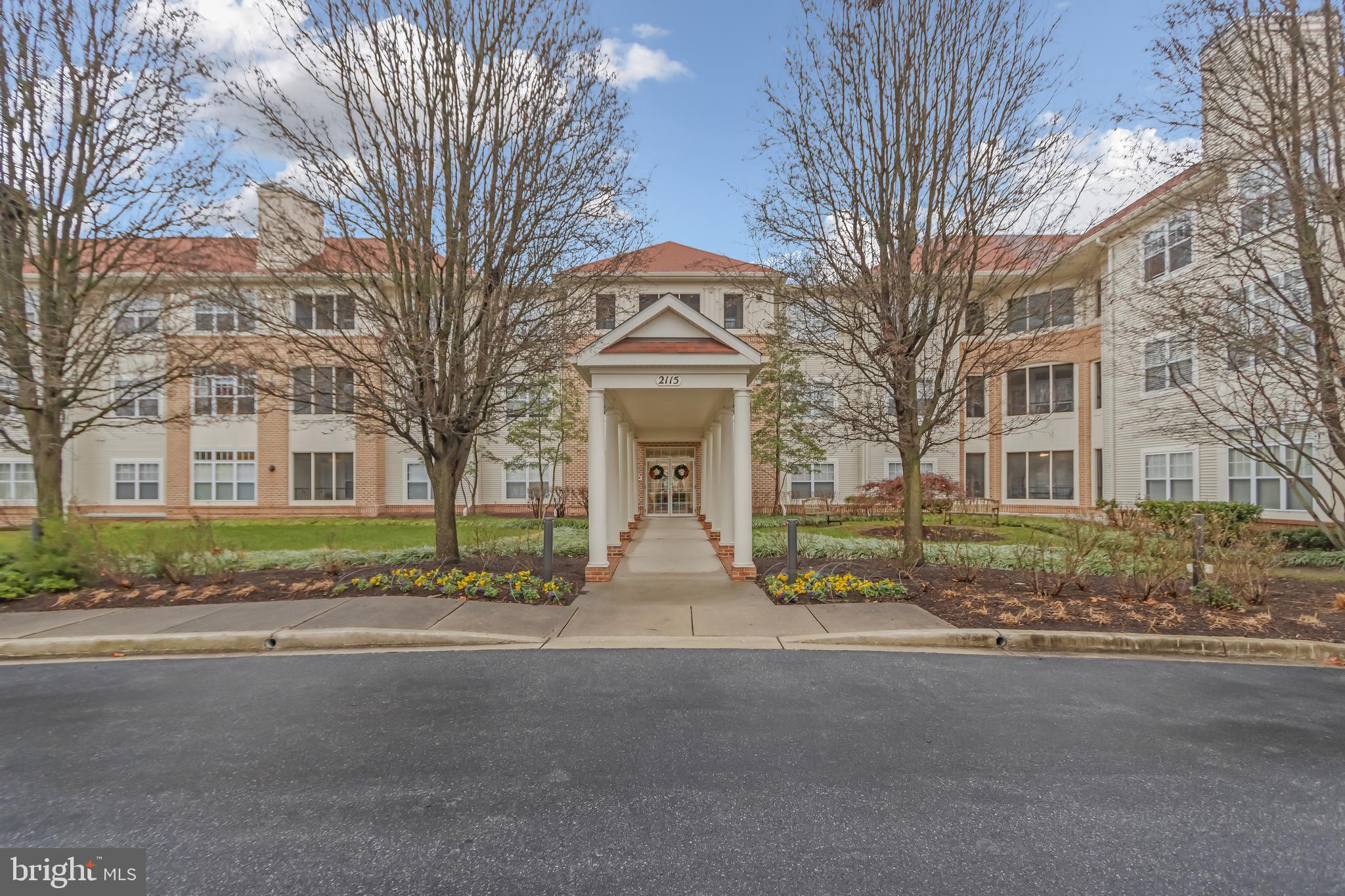 In the exceptional Waverly Woods community, this pristine condominium offers direct golf course views. Custom kitchen with, soft close cabinetry, gemstone marble counters & backsplash, Miele convection oven, Miele stainless steel appliances & breakfast area. Master bedroom with a luxury master bath featuring integrated vanity lighting. Bamboo floors, California closets, a full-sized washer, and a dryer are in a spacious laundry closet with room to store linens. High-end finishes thru-out, Crown Molding, Chair Railing, separate Dining Room, Private screened-in porch for those relaxing evenings & this third-level home is in a building with a secure entry and an elevator plus dedicated storage spaces, dedicated Bicycle storage space. THE BUILDING OFFERS AMPLE OF AMENITIES INCLUDING AN UNDERGROUND SECURED PARKING GARAGE, A CLUB ROOM, AND A COMMUNITY POOL. EASY ACCESS TO RESTAURANTS, SHOPPING, AND COMMUTER ROUTES. COMES WITH AN UNDERGROUND PARKING SPOT AND A SEPARATE STORAGE LOCKER! NO AGE RESTRICTIONS!