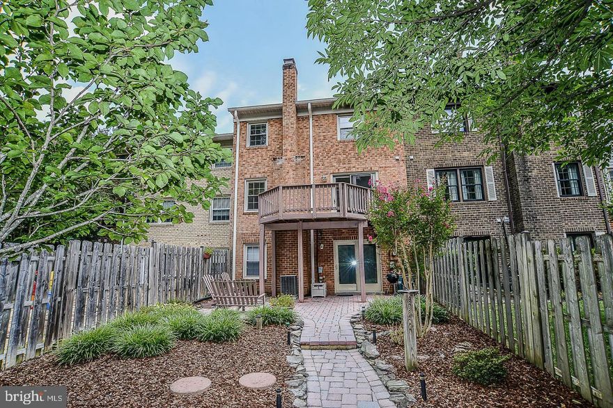 THIS 4 BEDROOM TOWNHOME IS TUCKED AWAY IN CHARMING TOWNES OF MOOREFIELD ACROSS FROM THE VIENNA METRO STATION. LARGE FENCED LANDSCAPED BACK YARD W/ DECK BACKING TO WOODS , TRAILS AND  NOTTOWAY PARK. ** REMODELED KITCHEN ** HARDWOOD FLOORS  ON MAIN AND UPPER LEVEL ** GRANITE COUNTERS ** 42 INCH CABINETS ** FINISHED WALK-OUT LOWER LEVEL W/ 4TH BEDROOM AND FULL BATH ** LARGE LAUNDRY ROOM ** 2 CAR GARAGE ** COMMUNITY POOL & TENNIS COURTS ** AT THE END OF HUNTER COURT WITH NO THRU TRAFFIC CUL-DE-SAC ** UPSTAIRS BEDROOMS  HAVE NEW HARDWOOD FLOORS (PHOTO'S SHOW CARPET) BEAUTIFUL HOME, GREAT NEIGHBORHOOD ALL IN THE TOWN OF VIENNA!! READY TO MOVE-IN NOV 1ST.