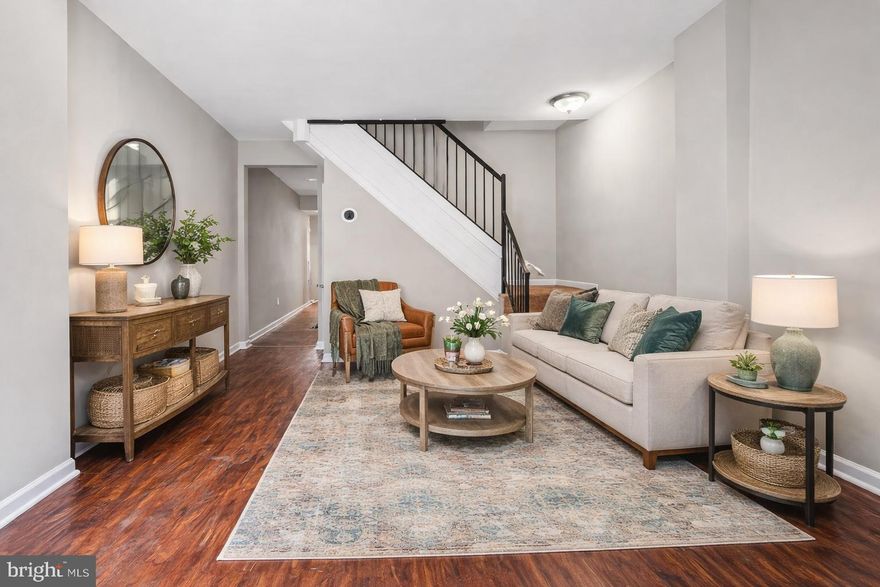 Welcome to this updated 4-bed, 2½-bath rowhome offering  1,587 sq ft of living space. Freshly painted with brand-new carpet, this home is move-in ready for its new owner. Enjoy LVP floors, a rear patio perfect for warm-weather relaxation, and a partially finished basement for extra storage or living space. Conveniently located near Johns Hopkins, Ellwood Park, and Bocek Park, this home blends comfort, character, and city convenience.