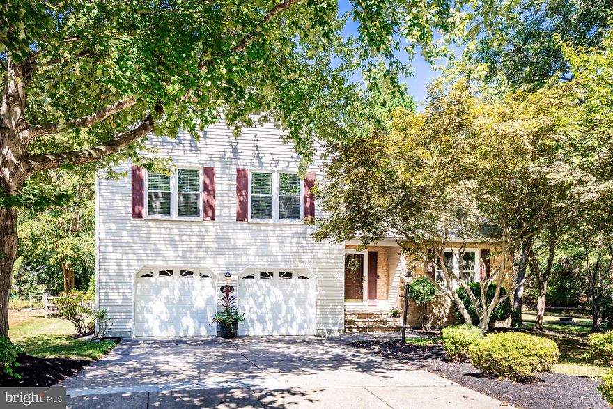 Welcome to your new home in the heart of Columbia! Nestled on a quiet cul-de-sac, this 4-bedroom, 3.5-bath beauty blends modern updates with everyday comfort. The show-stopping renovated kitchen shines with an oversized island accented by stylish pendant lights, recessed lighting, and under-cabinet lighting that sets the perfect mood for cooking or entertaining. Off of the kitchen is a dining area, which leads a few steps down to the informal stylish living room. The spacious family room features a propane fireplace framed by built-in shelves and cabinetry, creating the perfect setting for relaxing or hosting guests. Hardwood floors run throughout the main & upper levels, tying the spaces together beautifully.

The primary suite is a true retreat, featuring vaulted ceilings, a spacious sitting area, and a spa-like bath with a soaking tub and sleek walk-in shower. Main-level laundry adds everyday convenience with a folding shelf and laundry tub. Downstairs, the fully finished basement offers a private bedroom and full bath—ideal for guests, a home office, or extended family. OH, and the garage includes a 220 volt electric charging hook up.

Step outside to your fenced-in backyard, where privacy meets play, and enjoy being just steps from the community tot lot. All this plus an unbeatable location—minutes to The Mall in Columbia, Lakefront shopping and dining, the Merriweather District, and convenient commuter routes including Rt. 29, 32, 95 & 100.