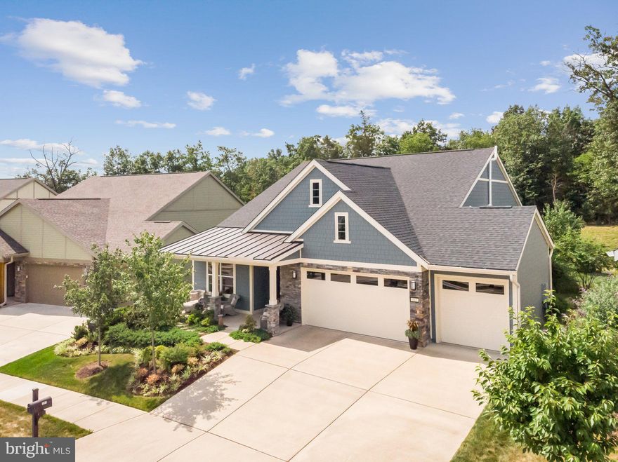 Experience the tranquility of single-level living in this delightful 2-bedroom, 2-bathroom, 3-car garage home on an amazing, professionally landscaped lot. Nestled against a serene treed area, this Refresh model by Shea Homes offers the perfect blend of comfort and convenience in the 55+ Trilogy at Lake Frederick community.
<br><br>
As you step inside this beautiful home, you're welcomed by an open and inviting floor plan, flooded with natural light and ideal for both relaxation and entertaining. The spacious living area flows seamlessly into a modern kitchen, featuring updated appliances, sleek granite countertops, and ample counter space for all your culinary needs. The expansive center island not only adds functionality but also offers a perfect spot for casual dining and social gatherings. Cozy up around the stunning stone gas fireplace or gaze outside to enjoy the plentiful wildlife. This home is designed with an eye for detail and convenience, making every moment spent here a pleasure.
<br><br>
Both bedrooms are generously sized, with the primary suite featuring an ensuite bathroom for added privacy. The second bedroom is perfect for guests with a full bathroom nearby, and there is a separate room that is perfect for a home office, craft room, and more!  The three car garage provides ample space for parking, storage (don't miss the bonus attic storage space), and recreational vehicles!
<br><br>
One of the standout features of this home is its beautiful outdoor space. Enjoy peaceful mornings and evenings on your private patio, which backs to a lush, wooded area providing a sense of seclusion and connection with nature.
<br><br>
As a resident of Trilogy at Lake Frederick, you'll enjoy a wealth of incredible amenities designed to enhance your lifestyle. Dive into relaxation with both indoor and outdoor pools, stay active in the state-of-the-art fitness center, and unwind at the well-equipped community clubhouse. Savor gourmet meals at the farm-to-table restaurant and socialize in the exclusive members-only lounge. For the sports enthusiasts, tennis and pickleball courts, as well as a dog park, offer ample opportunities for recreation, while extensive lake trails beckon for serene strolls and outdoor adventures. Join a vibrant community of welcoming neighbors and future friends. Experience the pinnacle of resort living at Trilogy at Lake Frederick—where your dream home and ideal lifestyle come together seamlessly.