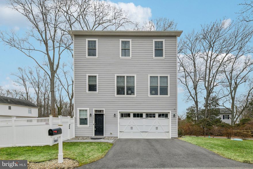 Coming Soon in Selby on the Bay. This 2020 new construction luxury home offers breathtaking water views and seamless modern living with whole-home smart technology controlling lighting, climate, blinds, locks, and garage. The light-filled main level features 10’ ceilings, expansive windows, and a gourmet kitchen with 42” cabinetry, granite counters, large island, gas cooktop, and open flow to the dining area and deck, perfect for entertaining. The family room is anchored by a cozy gas fireplace. Upstairs, the primary suite boasts stunning water views, multiple closets, and a spa-inspired bath with heated floors, dual vanities, and oversized shower, along with two additional bedrooms, a full bath, and upper-level laundry. The versatile lower level includes a flexible rec room/office and an oversized two-car garage with new polyurea flooring (2024) and wired for EV charging. Outside, enjoy a fully fenced, professionally landscaped yard with custom paver patio, fire pit, lawn irrigation, shed, custom outdoor lighting, and new concrete patio (2024). Located in the amenity-rich Selby on the Bay community with community center, beach, and boat launch all within easy access to Annapolis, DC, Baltimore, and Virginia. This home delivers refined waterfront living at its best.