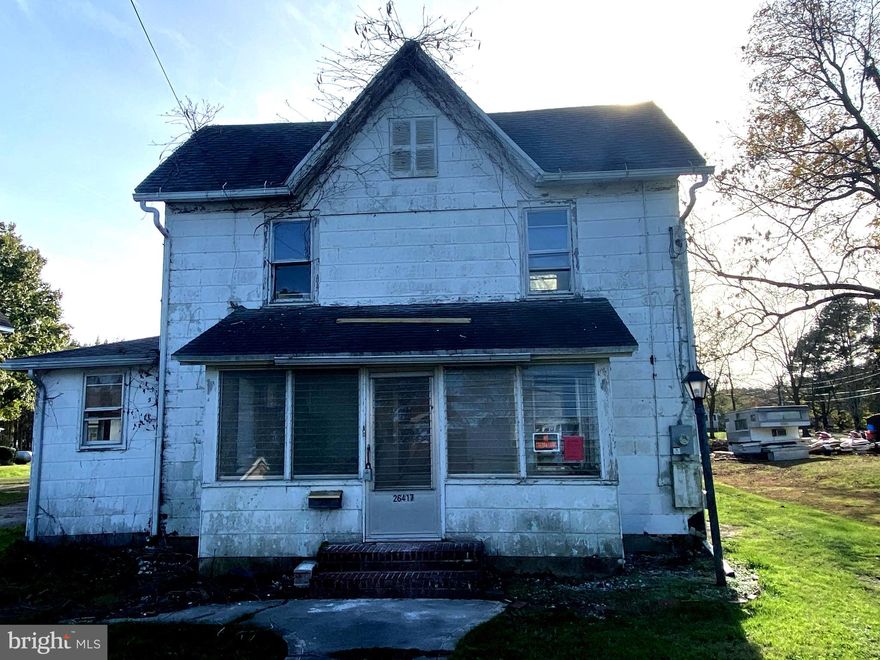 The interior of the house has been mostly gutted and will need new flooring on the main level. The property is being sold 'AS IS'. Public water and sewer already on site. For any renovation the 50% FEMA rule applies because of this a tear down might be a buyers best option. The price reflects the value of the land.  The location offers the ability to experience many local amenities including: popular seafood restaurants, Somers Cove Marina, public boat ramps, Janes Island State Park, Crisfield Library, Crisfield’s Wellington Beach, Ward Museum, art galleries, and more.