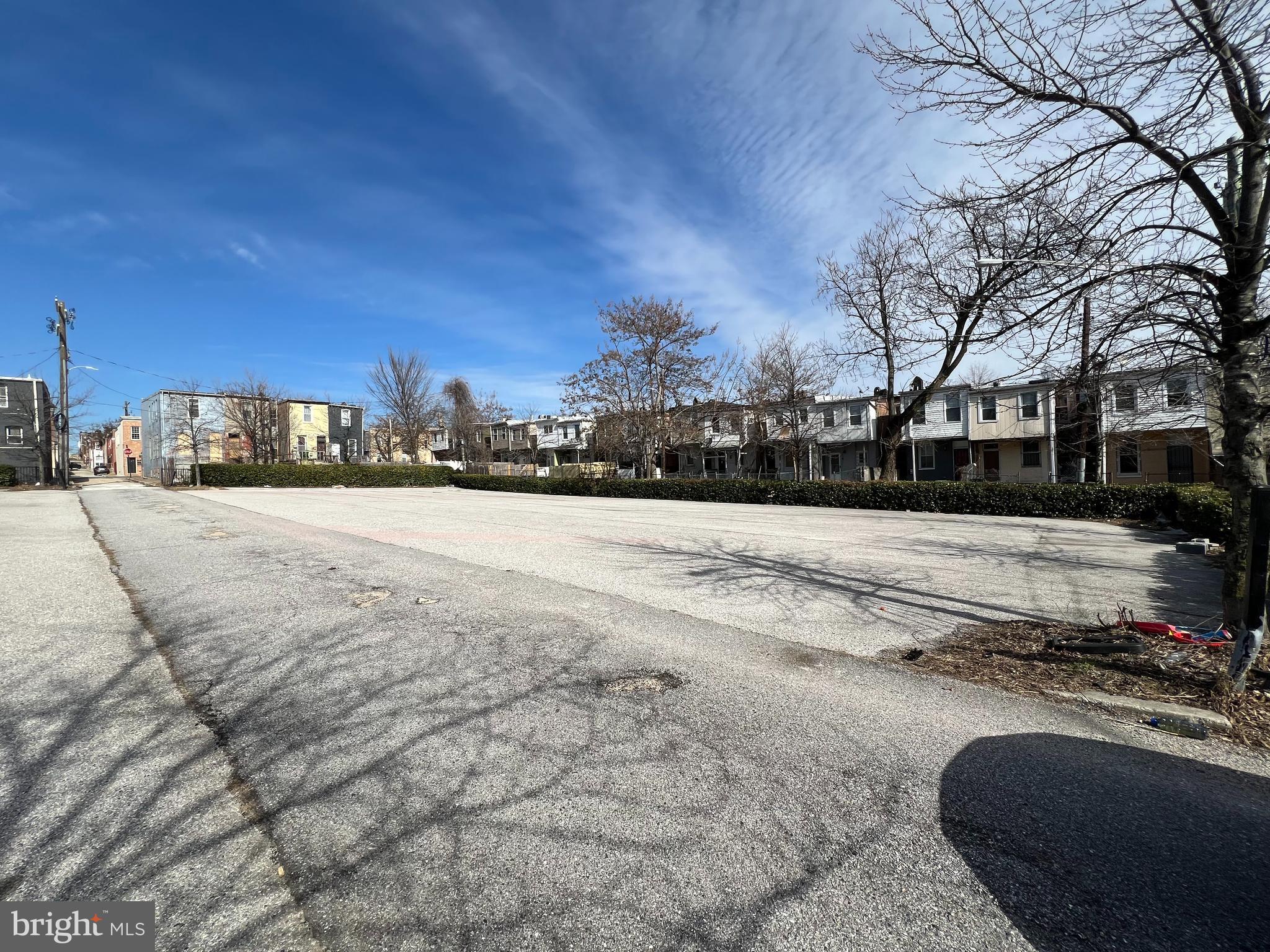 Baltimore City lots available for purchase! Lots 77-89 were consolidated and approved by Baltimore City. Request documents for reference. This lot is covered in asphalted by owner. Additional lots parallel to 1601 N Dallas St also available for purchase, see MDBA2157338. Consider a future residential development. Ask about additional lots on E. Lanvale St.