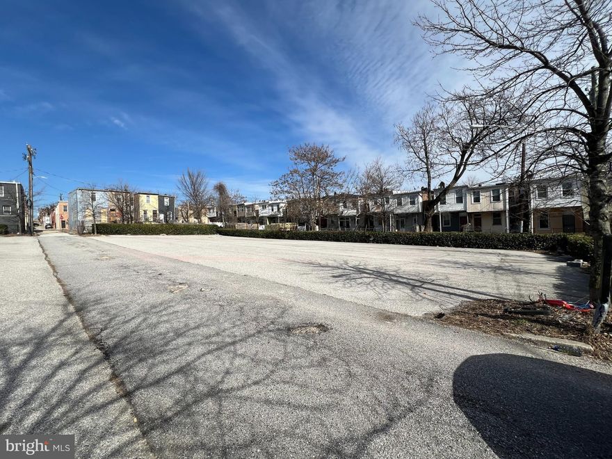 Baltimore City lots available for purchase! Lots 77-89 were consolidated and approved by Baltimore City. Request documents for reference. This lot is covered in asphalted by owner.  Additional lots parallel to 1601 N Dallas St also available for purchase, see MDBA2157338. Consider a future residential development. Ask about additional lots on E. Lanvale St.