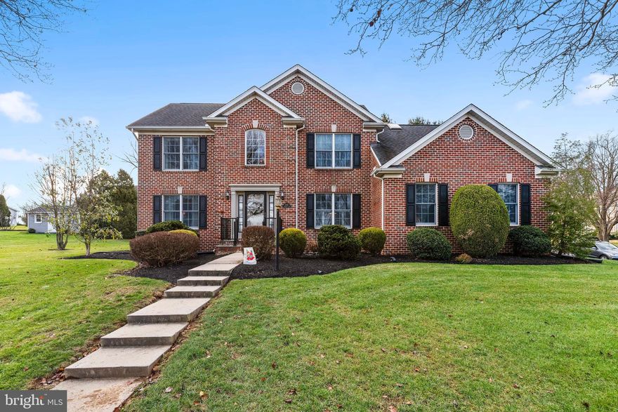 Pride of ownership is evident throughout this immaculately kept, 3,000+ square foot home.  The lovely updated kitchen has quartz countertops, recessed lighting and top of the line stainless steel appliances.  This is open to a breakfast nook and cozy family room with gas fireplace.  The first level also has formal living and dining rooms as well as a separate den/office with built-in bookshelves - perfect for an in-home occupation! A grand 2-story foyer boasts the authentic and upgraded hardwood floors which have been added to the entire house. Upstairs, you will find a primary suite with huge walk-in closet and garden tub as well as three additional bedrooms.  The partially finished lower level offers extra space with family room and fireplace.  Spend weekends entertaining and relaxing on the rear patio that has trex decking, pavers and a pergola.  Mechanicals are all in excellent condition and the HVAC is serviced yearly.  Lots of love has been given to this home over the years as this sprawling two story awaits it's new owner.