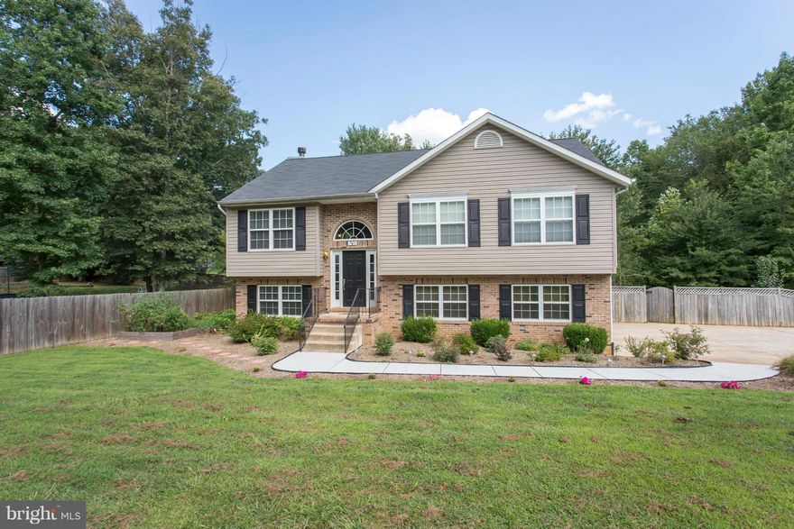 Immaculate *Move in Ready* Home in Sought After Stafford County w/ Fantastic Curb Appeal!! Home Offers; 4 Bedrooms, 2.5 Baths, Gleaming Hardwood Floors, New Carpeting, Custom Paint Throughout, Finished Basement w/ Wood Burning Fireplace, Stone Patio, Large Deck, Fully Fenced Backyard w/Fire Pit, & Vegetable Gardens---Perfect for Entertaining!! The Community Lake is Great for Fishing & Boating!!