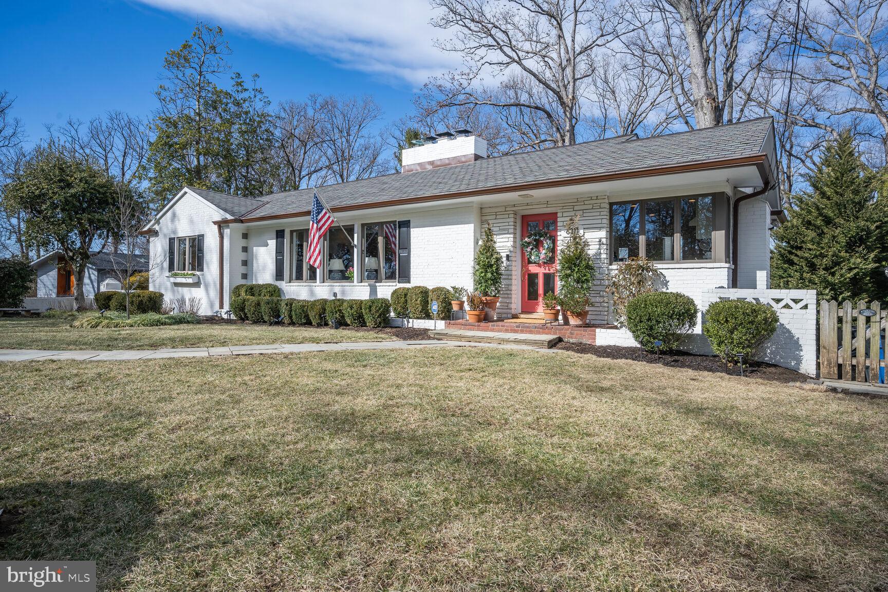 Prepare to fall in love the moment you see this beautifully renovated five-bedroom, three-bathroom white brick home in the idyllic Woodhaven neighborhood of Bethesda! Conveniently located on a quiet cul-de-sac in the Whitman district, 6211 Poe Road perfectly combines modern conveniences with historic charm. Upon entry, enjoy tons of natural light to highlight the stunning and refinished original black walnut floors. The gourmet chef’s kitchen features ample cabinetry, a gas range, quartz counters, and modern light fixtures. Make your way to the formal dining room with access to the huge back deck, perfect for indoor/outdoor dining and entertaining. Open to the dining room is a spacious and bright living room with beamed ceilings and one of three wood-burning fireplaces.
Enjoy the convenience of main floor living, with the primary suite as well as two additional bedrooms and a hall bathroom all on the entry floor. The primary suite is a cozy and luxurious oasis featuring a wood-burning fireplace with oversized painted brick surround. The renovated primary bath features a dual vanity, walk-in shower, and designer finishes. The two additional main-floor bedrooms offer ample closet space and share a beautifully renovated hall bathroom. Bonus alert: All closets on the main level are cedar-lined.
Downstairs, you’ll find an adorable built-in nook, perfect for homework and/or working from home! The warm and inviting family room with the third wood-burning fireplace is perfect for cozy family gatherings or entertaining. On this level you’ll also enjoy two additional true bedrooms with closets and natural light, as well as another renovated bathroom with stunning tile details. A flexible bonus space has been converted to a private home office and would also work as a home gym or flex room! Conveniently located laundry can be found in the huge utility room offering access to the oversized one-car garage, perfect for all of your storage needs!
With beautiful wooded views and a quarter-acre lot with a fenced, flat backyard, this picturesque home offers both privacy and convenience. Just minutes from downtown Bethesda, a very short walk to Landon, Burning Tree, Pyle, and Whitman schools, public transportation, I-495, and so much more, you don’t want to miss this opportunity to enjoy the tranquility and history of Woodhaven! Pre-inspections are welcome and encouraged. Please submit offers by noon on Tuesday, March 4th.