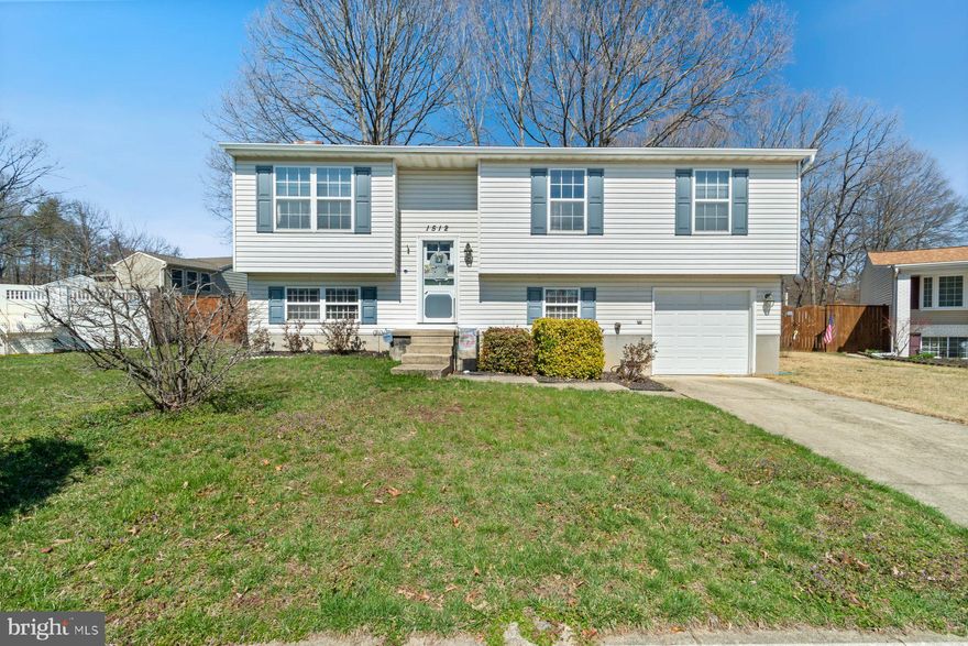 Move-in ready and newly refreshed 3BR/3BA split foyer located on a spacious lot in the quiet neighborhood of Windswept Estates. Step into the main living space which boasts an open concept living room, dining room, and kitchen.  The kitchen offers plenty of cabinets, a separate pantry closet, black and stainless appliances, beautiful granite countertops with a complimenting tile backsplash, and a raised breakfast bar with seating for three or more. To complete the main floor, down the hall are two sizable secondary bedrooms, a full bath, and primary suite.  The primary has a private bathroom with a walk-in shower featuring a bench for sitting.  On the lower level is additional finished living space featuring above grade windows, a full bath with walk-in shower, a large family room with a fireplace feature, laundry, storage, and access to the one-car garage.  From the sliding doors in the dining room, step outside to a large wood deck that overlooks a fenced yard filled with green space, adult trees, and tons of possibilities. This home is move-in ready and ideal for any new homeowner, and is located within close proximity to shopping, restaurants, and commuter routes. 
Update List: New LVP Flooring (2024), New Countertops and Back Splash (2023), New Front Door and Sliding Door (2021), New Dishwasher (2021), New Washer/Dryer (2019), New HVAC System (2016), New Roof (2015), New Refrigerator (2015), Garage Door Opener Installed (2013)