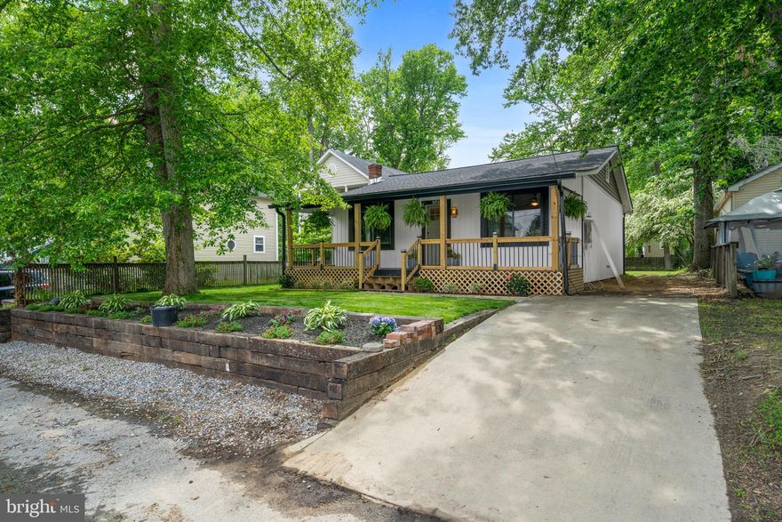 Newly renovated turn key ready home in sought after North Beach.  Two large bedrooms.  Updated. bathroom.  The kitchen has  new soft close cabinets and appliances..  The washer and dryer are new.  Hot water will never be an issue with this tankless water heater.  The roof is new and so are the windows.  Enjoy entertaining on your deck in your spacious backyard.  Steps from the Chesapeake bay and all the amenities North Beach has to offer!!!