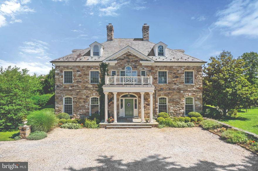 Rarely does a generational property of consequence come to market in the Middleburg area. 
1749 Atoka Road represents an opportunity to own one of the very finest country estates in the heart of Northern Virginia horse country, combining the stately elegance of a formal stone mansion with land features and equestrian facilities that can be found nowhere else. 
The magnificent main residence boasts over 17,858 square feet of gracious living with a floorplan that works for both formal entertaining and raising a family - and which overlooks  100+ acres of the most beautiful and diverse land that cannot be replicated with mature plum, peach and apple orchards, riding trails, mature forests, galloping fields, multiple wildlife ponds, streams, marshland, Olympic-sized jumping and dressage arena, an 12 stall barn with two tack rooms, round pen, dry lot, oversized paddocks and multiple guest homes  all with the prestige of an Atoka Road address.
The custom-designed mansion offers many imported European design elements and features a formal entry foyer flanked on either side by grand living and dining rooms. A spacious kitchen, adjoining family room with wood beamed ceiling and massive stone fireplace, glorious sunroom and private office with large bay-window and built-in cabinetry make up the remainder of the first floor. The second floor is accessed off a grand staircase with soaring ceilings leading to separate primary and guest wings. The primary suite boasts a separate sitting room with fireplace, outdoor balcony overlooking the pool area and expanse of the property and separate bathrooms with over-sized closet space. The guest wing features 3 oversized bedrooms, each with its own bathroom. The third floor features two additional bedrooms and bathroom. A finished basement completes the house, featuring multiple rooms of substantial size including a theater room, exercise room, storage room with custom wood shelves and family room. A separate 2-bedroom apartment is situated above the attached 4-car garage. 
Dispersed throughout the property are a 3-bedroom, 2,754 sf. stone cottage, a 2-bedroom groom’s home and a multi-bedroom “House in the Woods” that can be restored or sold-off if not desired as two separate lots.  
The equestrian facilities were designed with the serious equestrian in mind. The owners’ daughter is an accomplished professional dressage rider and each feature was designed with the goal of being pleasing to both horse and rider. The exceptional main riding arena is an Atwood Equestrian Surfaces arena measuring approximately 170’ x 230’ and featuring GGT footing. It is currently used for both jumping and dressage. The wood-walled 60’ diameter round pen also features Atwood footing and adjoins a separate dry lot. The 9,000+ square foot  classic wood barn features newly varnished wood-work and a stately chandelier, 12 stalls, two tack rooms, custom Polylast aisleways, multiple wash stalls with high-speed fans and heaters, laundry facility, temperature controlled feed room and multiple storage areas. The 15 lush paddocks are all oversized allowing for ample grazing. 
The acreage on which all of these facilities are situated is absolutely without compare in the marketplace today, offering fruit orchards, ponds, streams, riding trails (with potential access to over 1,000 acres of adjoining ride-out privileges), mature trees throughout, galloping fields, re-wilding areas, gardens, a marsh that is home to multiple bird species including red-winged blackbirds and even a frog pond with a stone waterfall.  
You will not find a more impressive property on the market today that offers so much and which is perfect for so many different lifestyles. This elegant estate is in the middle of Hunt Country and is minutes from downtown Middleburg. Dulles Airport is only 30 minutes away, and the Capital is less than an hour from the property.