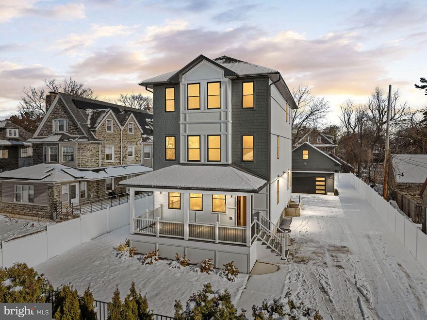 When you love being number one—when you choose to be unique, elegant, and unforgettable—this home delivers. Designed to command attention from every passerby while offering exceptional privacy and security, this newly built modern “castle” is perfectly positioned on the border of Philadelphia, where vibrant city energy meets the calm of suburban living.

Step into this exceptional residence featuring a spacious open-concept first floor crafted for modern living. The sun-filled living room showcases soaring ceilings and oversized rear windows, creating an airy and welcoming atmosphere. 
The layout flows seamlessly into the chef’s kitchen, outfitted with granite countertops and backsplash, Kitchen Aid stainless steel appliances, vine coolers and abundant custom cabinetry. Toward the rear of the home, a dedicated dining area and additional seating nook provide an ideal setting for everyday living or entertaining. From here, step directly onto the rear deck—perfect for grilling or relaxing outdoors. 

The 5 feet wide open concept staircase will get you to the second floor offers a versatile lofted lounge along with a custom-designed laundry room located on the same level as the primary suite for maximum convenience. The luxurious primary bedroom features two expansive closets and oversized windows that flood the space with natural light. The spa-inspired en suite bathroom includes a double vanity, soaking tub, and a spacious walk-in shower.

The third floor features four well-sized bedrooms, each with ample closet space. Two of the  bedrooms share a Jack-and-Jill bathroom with a large linen closet, while an additional full hallway bath completes the level.

The attic space is equipped with second- dual zoned HVAC unit which makes the temperatures on upstairs bedrooms custom! 

The fully finished basement provides additional living space for cinema, pool table space, wet bar and egress exits. 
 What truly sets this home apart is the detached garage with finished office space above—ideal for a private home office, studio, or guest retreat. The exterior is elevated by a modern designer concrete driveway with stone inlays, a custom remote-controlled gate, and thoughtful landscaping, delivering both curb appeal and enhanced privacy.

Additional highlights include a 10-year property tax abatement fully approved by the City of Philadelphia, offering significant long-term savings. Ideally located near Fairmount Park, St. Joseph’s University, public transportation, and major highways, this one-of-a-kind property combines luxury, security, and lifestyle in a way few homes can.

Schedule your private tour today—homes like this are rarely available.