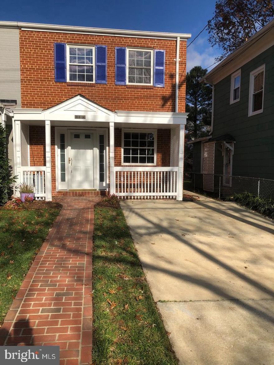 3 bed 1.5 bath side by side townhome located in Del Ray. Wonderful unit with hardwood floors. Galley Kitchen granite counters and nice appliances. Kitchen has a pantry and plenty of cabinet storage. Has stackable washer/dryer in unit . Three bedrooms on upper level all with carpet . There is also a linen closet in the upper hallway provides extra storage. A full bath with a lovely tiled bathtub/shower, granite counters on vanity and tiled floors all updated. Attic storage with pull down stairs in this unit. A large family room off the kitchen with hard wood floors and panoramic windows on three sides gives extra living space. The family room has a door that leads out to a beautiful stone patio in a fenced-in back yard great for entertaining or a play space. Off street parking with additional street parking available. . Located close to shopping, restaurants, transportation and DC. Great unit.