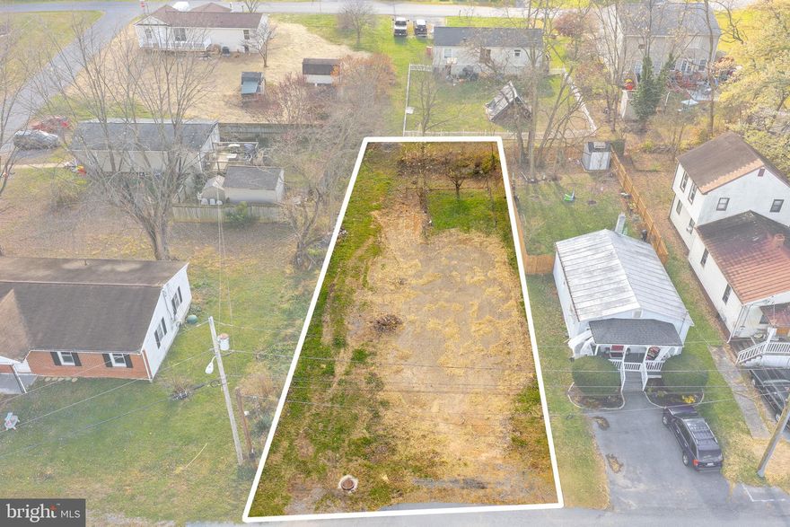 Build your dream home in Ranson! This cleared residential lot at 406 E 11th Avenue offers a prime opportunity to design a custom home in an established growing city. Utilities are available nearby, and the property is conveniently located near downtown Ranson and Charles Town. No HOA and easy access to Route 9 and commuter routes to Northern Virginia and Maryland.  Buyer to verify all information to their satisfaction. Buyer should conduct their own due diligence with the county and any relevant agencies to confirm zoning, utilities, soil, and that the property allows their intended use