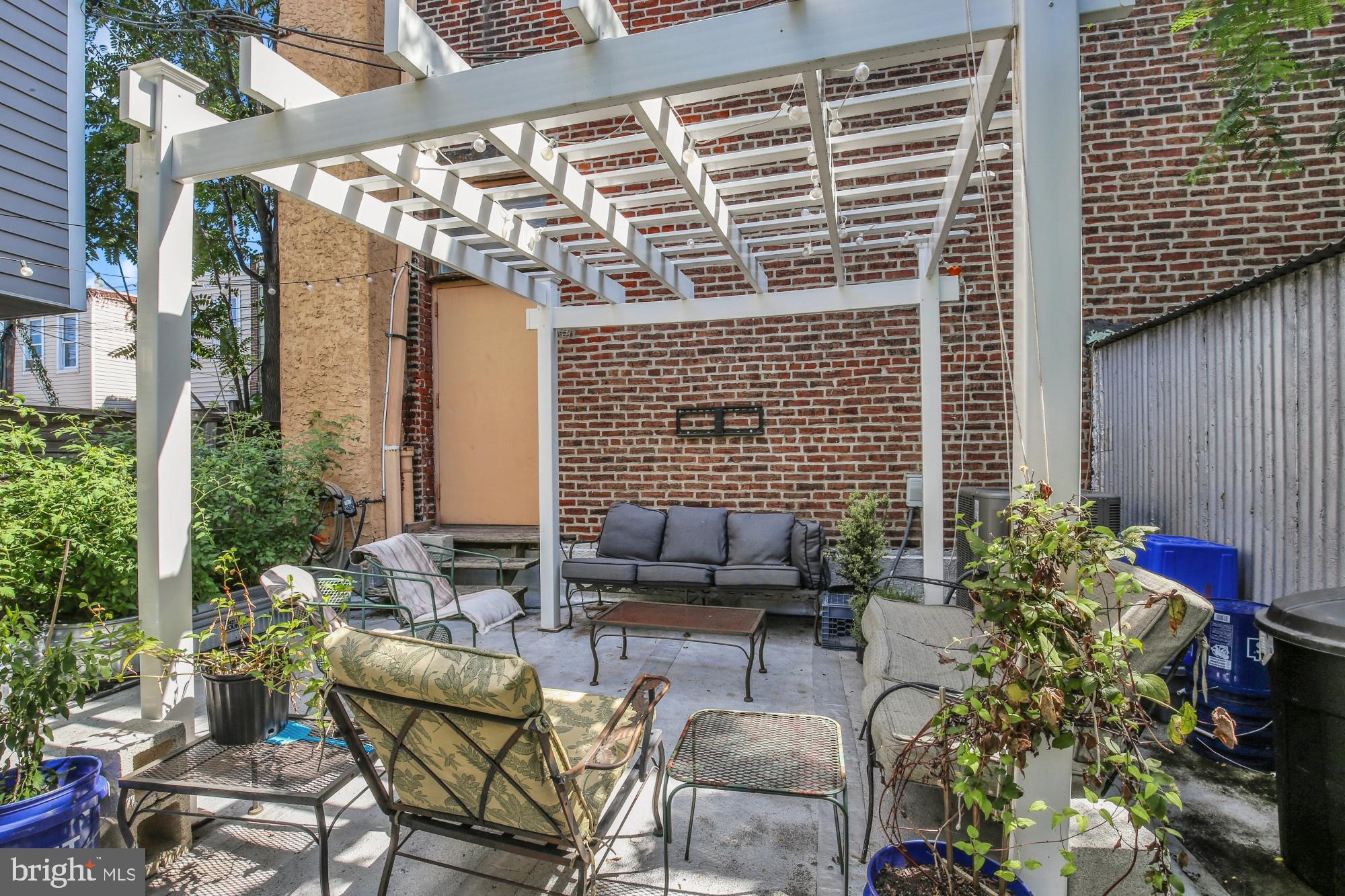 Available Now:
Welcome to 2512 E Lehigh Ave #LL! This unique Studio apartment is on the lower level of a wonderful building in Olde Richmond. This is a great live/work space for artists since the large, open space offers so many opportunities! Features include exposed brick walls, in-unit laundry, Central A/C, and a lovely shared outdoor space. Step into the expansive open floor plan with clean concrete floors, exposed spiral ductwork and no shortage of possibilities for furniture arrangements. The giant eat-in kitchen boasts tile flooring, cabinetry below and built-in shelving above, a dishwasher, gas range, and two refrigerators. An island is in the middle with a butcher block countertop for prep space and additional storage options. Your in-unit washer and dryer are installed in the kitchen by a painted exposed brick wall for added convenience. Continue to your bathroom with tile flooring, exposed brick, a vanity, medicine cabinet, and standing shower stall. You'll have access to a very big, shared outdoor patio with a fire pit and there's free street parking in the neighborhood. Schedule your tour today!
Lease Terms:
Generally, 1st month, 12th month, and 1 month security deposit due at, or prior to, lease signing. Other terms may be required by Landlord. $55 application fee per applicant. Cats are conditional on owner's approval and may require an additional fee and/or monthly pet rent, if accepted. (Generally, $250/cat). Strictly no dogs. Cold water is included. Tenants responsible for: electricity, gas, and cable/internet. Landlord Requirements: Applicants to make 3x the monthly rent in verifiable net income, credit history to be considered (i.e. no active collections), no evictions within the past 4 years, and must have a verifiable rental history with on-time rental payments. Exceptions to this criteria may exist under the law and will be considered.