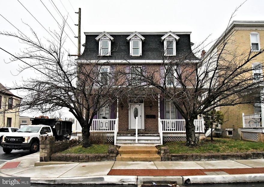 This charming Victorian is ready to realize it's full potential!  Presently it offers the unique and rare usage of  8 boarding room licenses and one 2 BR apartment license.  Another possibility one could consider might be; to convert the 1st and 2nd floor into 2 apartments with boro approval, or live on the 1st & 2nd floor and rent out the existing 3rd floor apartment.  Buyers should check with the boro for any use other than the current. There is a full basement, 3 separate electric services, and a large garage/barn structure with a 2nd floor space. There are fire escape stairs existing to each floor and each floor has it's own outside patio space.  The front porch is a perfect place to sit and enjoy summer leisure. Easy walk to all the amenities in Lansdale Boro and all it has to offer;  Summer Concert Series at Whites Road Park, Under the Lights Car Show, Founders Day fireworks, Mardi Gras and Christmas Parades and more. Conveniently located close to shopping, dining, public parks, and public transportation. So many possibilities await!
