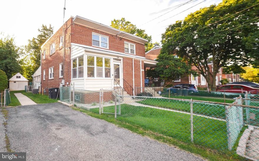 Location, Location, Location!!! Charming 3 bedroom 2.5 bath brick colonial end unit. This home has been freshly painted, new refrigerator, new kitchen cabinets, new granite counter top in kitchen, new dish washer, new built in microwave, boiler system for the hot water heat is new, as well as the HVAC.  Lots of storage, and a secret door panel used for storage. There are gorgeous refinished wood floors throughout the house. Includes an enclosed front porch vestibule, large enclosed back patio sunroom off of kitchen with a separate entrance.  Lower level has a full bathroom, knotty pine downstairs, large family room with bar, and laundry room.  It includes a separate workshop with an electricity and heating element.  Fenced in level front and back yard, with a built in BBQ area in the back. Walking distance to a park, as well as close to the metro, and mall, and other public transportation, and shopping.  Ready for you to move in.