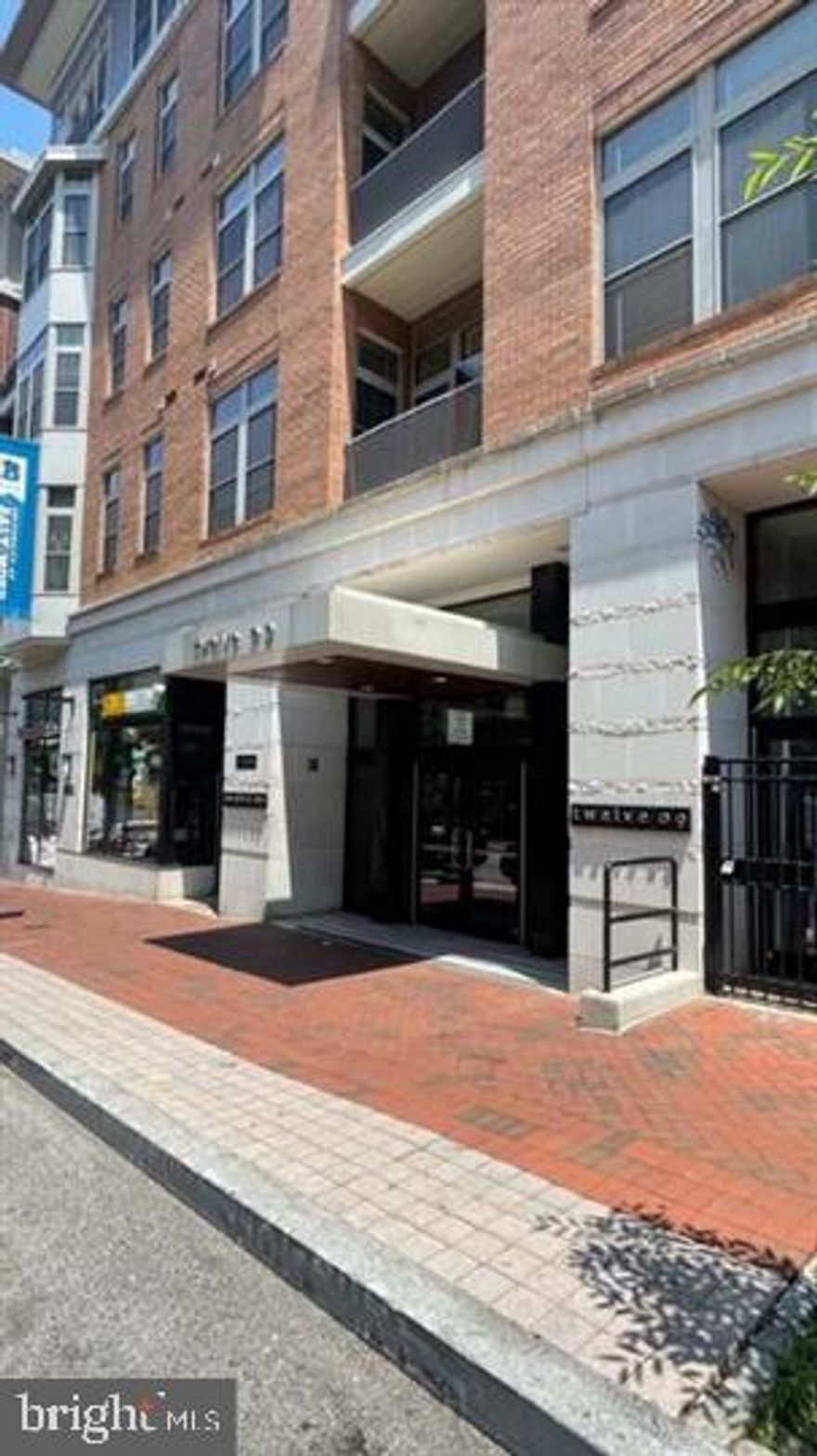 Price Adjustment! Beautiful bright filled 2 bedroom, plus bonus room den/office, 2 full bath 3rd level condominium located in Historic Mount Vernon! Unit includes, elevator, 24 hour secure and monitored building, SS appliances, washer and dryer in the premise, Hardwood floors, granite countertops, and one
assigned garage parking space! Lastly packages are safely delivered, including designated Amazon storage
closets!  Enjoy walks around historic Mount Vernon and convenient to shops and
restaurants and Major Hospitals UMMC, VA and Maryland General Hospital and major routes, I-83.  Location, location location!