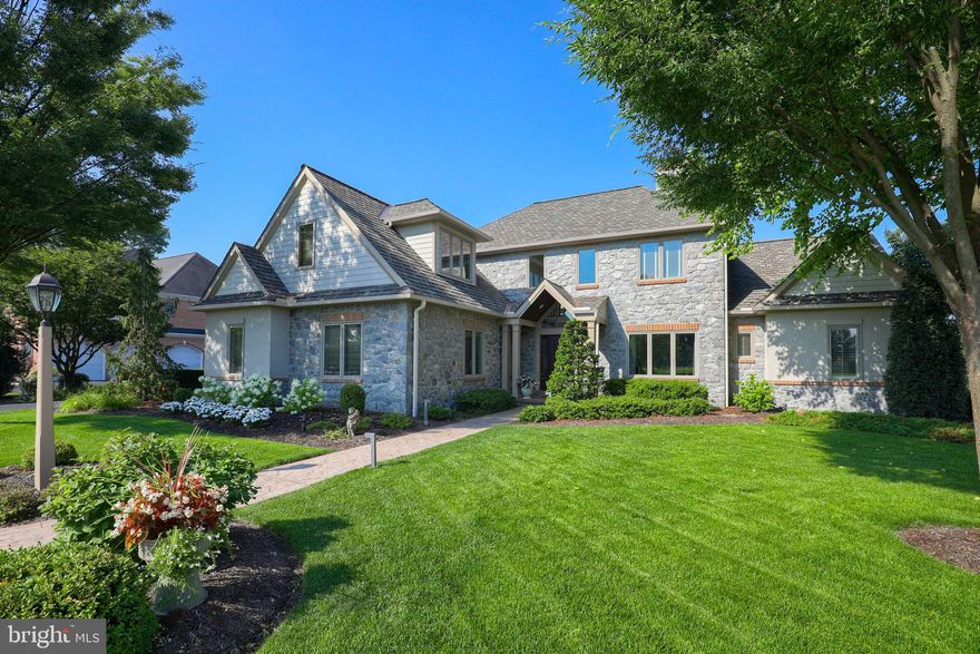 Beautiful five-bedroom custom home in Bent Creek Country Club with everything you can imagine, including an in-ground pool and scenic golf course views! The finished lower level hosts a rec room with wet bar; climate controlled wine cellar; exercise room with sauna; and extra storage space. Large first floor owner's suite with fireplace, private bath and sitting room that opens to a private patio; living room or den with two-sided fireplace to formal dining room; family room with fireplace; gourmet kitchen; breakfast room; screened-in porch that opens to patio and pool area; and laundry room with pet shower. Hickory hardwood floors, chair rail, crown molding, and marble floors are some of the fine finishing touches you'll truly appreciate.