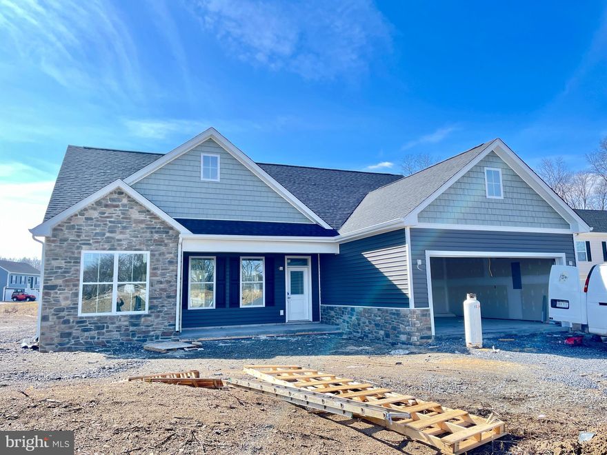 One level living on a corner lot!  This new home will be ready for a late February move in date.  The house includes great features like quartz counters, lvp flooring, oversized windows and a soft close cabinetry.  Enjoy your spacious bonus sunroom or walk out to your backyard patio.  Elevated ceiling heights make this house feel bigger than it is.  The primary suite has an oversized bathroom with a tiled shower surround and spacious walk in closet.  $11,700 from the builder toward closing costs.   Act fast and pick your interior colors!