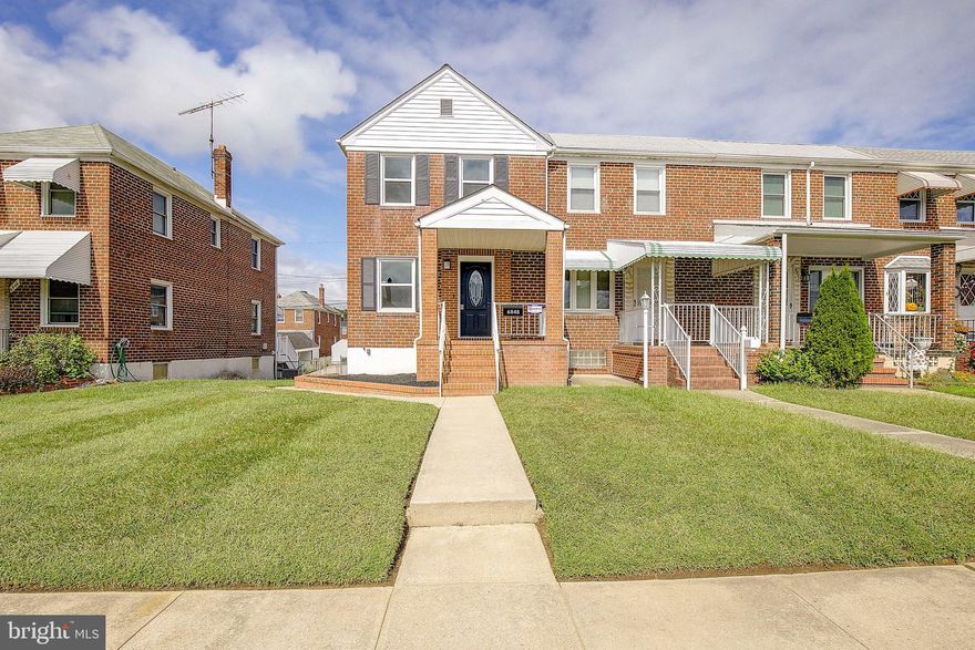 This beautifully remodeled, all-brick end-unit townhome boasts fantastic curb appeal with a charming front porch. Located in the quaint Graceland Park community, the property offers a private two-car driveway accessible through the back alley. The home has been freshly painted with updated flooring throughout all levels and features replacement doors and windows. The main level offers an open-concept living and dining area with upscale laminate flooring, a modern kitchen with upgraded granite counters, and all-new stainless steel appliances. Upstairs, you'll find three spacious bedrooms and a full bath. The lower level includes a recreation room with a brick hearth gas fireplace and a second full bath. A convenient laundry room with an outside exit from this level also exists. Additional upgrades include a new water heater and attic fan. Outside, enjoy the refurbished deck and fenced yard—perfect for relaxation. Best of all, there's no ground rent!