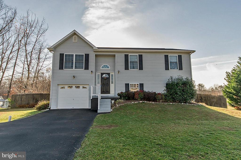Corner lot with large deck, overlooking fenced in back yard. Large family room with walkout basement ready to be made into Man Cave.