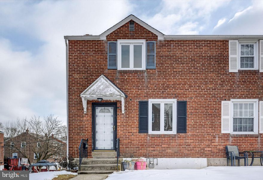 Welcome to this well-maintained brick twin-style colonial situated in the heart of Sharon Hill. The main level features a spacious living room and dining room that flow seamlessly into a newer eat-in kitchen equipped with a breakfast bar, dishwasher, disposal, and electric cooking. Upstairs, you will find three comfortable bedrooms featuring hardwood floors and access to a floored attic with pull-down stairs for additional storage. This home offers 2 baths and a full, semi-finished walk-out basement that includes laundry facilities and outside entrance access. The exterior boasts a brick finish and both front and rear yards. Parking is effortless with both off-street and on-street options available. Located within the Southeast Delco School District and close to Academy Park High School, this move-in-ready home perfectly balances classic construction with updated amenities.