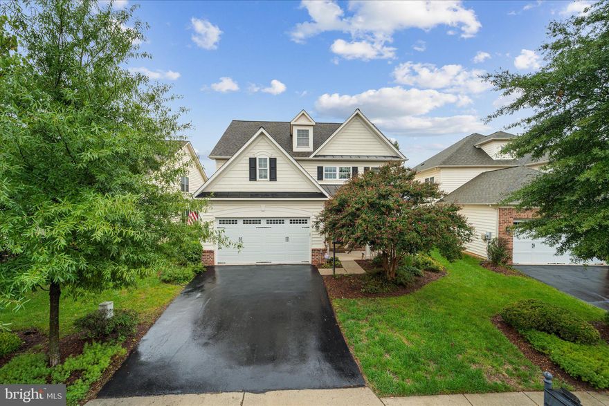 Welcome to your new oasis in the heart of Potomac Green, a premier gated community in Ashburn, VA. This beautifully maintained highly sought after Wythe model is a 3-bedroom, 3.5-bathroom detached home that boasts a special covered patio, perfect for outdoor entertaining and relaxation. With a roof that's just 3 years old, you can move in with peace of mind knowing that this home has been lovingly cared for by its owners.
As you enter, you'll be greeted by a bright and inviting living space, featuring a floor plan that seamlessly connects the living room, dining area, and gourmet kitchen. The kitchen is equipped with modern appliances and ample counter space, making it a chef’s delight. The primary suite is a luxurious retreat, complete with a beautiful bathroom and generous closet space. Step outside to your covered patio, where you can enjoy al fresco dining or simply unwind in your private outdoor retreat, surrounded by lush greenery.
The upper level features two spacious bedrooms, each with its own en-suite bathroom, providing comfort and privacy for family and guests. There is also a bonus room upstairs that could be used as a 4th bedroom!
Living in Potomac Green means embracing an active lifestyle if you choose! The community offers a spectacular 29,000 square-foot clubhouse with a state-of-the-art fitness center, an invigorating aerobics studio, and a grand ballroom. Enjoy a variety of recreational amenities, including tennis and pickleball courts, bocce ball courts, and both indoor and outdoor swimming pools, as well as an indoor walking track. With an HOA that covers all community facilities, lawn maintenance, trash pickup, and snow removal, you'll have more time to enjoy the vibrant community. Plus, great neighbors and convenient access to One Loudoun, the Senior Center, and a dog park just a short walk away make this an ideal location.Don’t miss the chance to make this charming home yours. Schedule your private showing today! Interior Photos Coming Wednesday 10/2