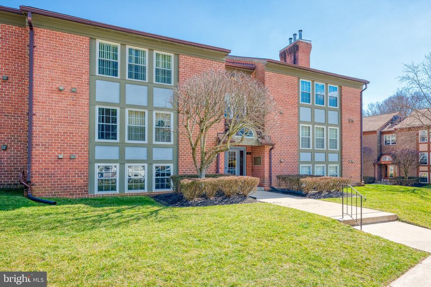 Walk in and you'll instantly feel at home in this beautiful bright lower level 2BR/2BA condo . An abundance of natural light, upgraded kitchen, ample parking, and a patio overlooking green space! This property is a delightful planned community which is classically designed and perfectly situated to let you take advantage of the county's excellent schools and activities. Community pool located close by for fun summer days.  Convenient to 695/83.  Professional pictures coming soon.