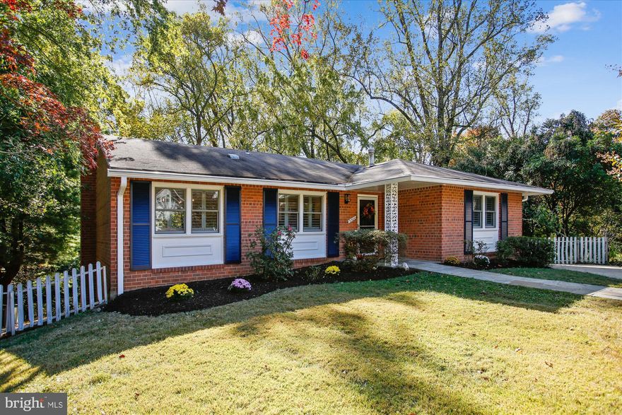 Welcome to your private retreat in highly sought-after Arlington Forest, where timeless charm meets modern comfort. This classic two-level brick home, lovingly maintained by long-term owners, offers 3 main level bedrooms and 3 full baths.  Tucked away on a cul-de-sac, this house is made for entertaining with an open dining/living room layout that walks out to a spacious deck, with plenty of room for dining, grilling and enjoying unobstructed views of the private yard and gorgeous parkland! Fresh paint from top to bottom enhances the gleaming interior with thoughtful updates throughout, including professionally restored wood floors on the main level for lasting shine and durability, brand new quartz kitchen countertops, GE gas range & dishwasher, main level bathroom fixtures and window shutters. The lower level extends the living space with a generous recreation room with updated LVP flooring, full bath, a bonus office or workout room and utility room with washer and dryer, while ample attic storage keeps everything neatly tucked away.  Nature lovers have easy walking and cycling access to Lubber Run Park & Amphitheater, Edison Park, Long Branch Nature Center, Upton Hill Regional Park, Arlington Forest Park, Bluemont Park. Swimmers and tennis players are walking distance to Arlington Forest Club.  This home is 1.2 miles to Ballston and 1.6 miles to Virginia Square – GMU Metro Stations and nearby major roadways – Route 50 & Interstate 66 making this home the perfect balance of suburban serenity and urban connectivity with effortless commutes to Washington, D.C., the Pentagon, and National Airport.