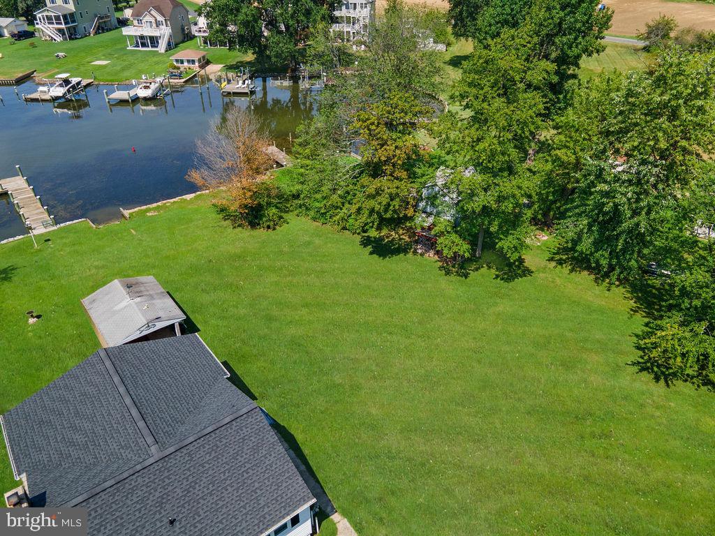 Discover the perfect opportunity to create your ideal waterfront escape on this 0.41-acre flat lot nestled along the scenic Galloway Creek in Bowleys Quarters. Whether you're envisioning a peaceful weekend getaway or your forever home, this property offers the space and setting to bring your vision to life.
This is raw, undeveloped land, giving you a blank canvas to design exactly what you want. Electric, public water, and public sewer are available at the street (note: a grinder pump will likely be required).
The lot is located within a floodplain and the Chesapeake Bay Critical Area (CBCA)—specifically in a Limited Development Area and Modified Buffer Area—which means some building restrictions will apply. Buyers are responsible for verifying all zoning, building requirements, and utility hookup procedures with Baltimore County. There is no HOA – but voluntary membership is available in the Bowleys Quarters Community Association. Great potential to build a custom home or private pier (subject to county and environmental approvals). Close proximity to waterfront dining, marinas, and boating opportunities on the Chesapeake Bay.
This rare opportunity combines tranquil waterfront living with endless potential. Don’t miss the chance to make your waterfront dreams a reality!