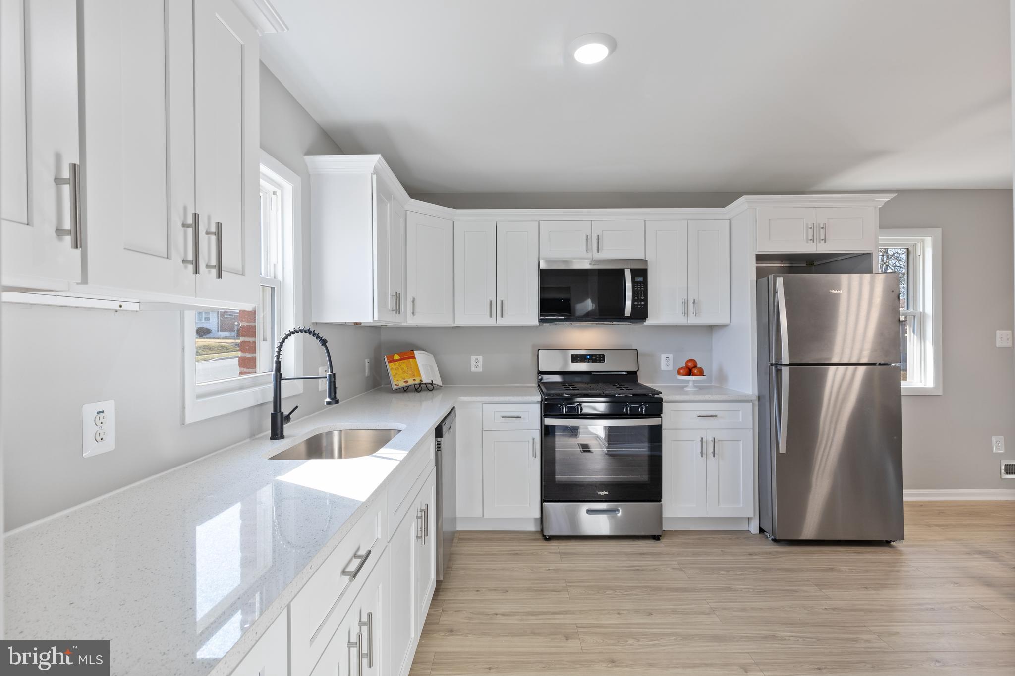 5.5% 30 year fixed rate available from a local bank - inquire to learn more!
Welcome to 7418 Remoor Rd, a beautifully renovated 3-bedroom, 2 bathroom single-family home in Baltimore, MD. This home seamlessly blends modern amenities with classic charm. The spacious open-concept living area boasts recent updates, including new windows, luxury vinyl plank flooring, and a gourmet kitchen with stainless steel appliances and quartz countertops—perfect for entertaining. Enjoy the convenience of a finished basement, offering additional space ideal for a home office, gym, or recreation room. Step outside to the expansive backyard, a private oasis perfect for outdoor gatherings or quiet relaxation. Nestled in a peaceful neighborhood with easy access to shopping, dining, and major highways, this home offers the ideal balance of suburban tranquility and urban convenience. Don’t miss your chance to make this stunning property your own!