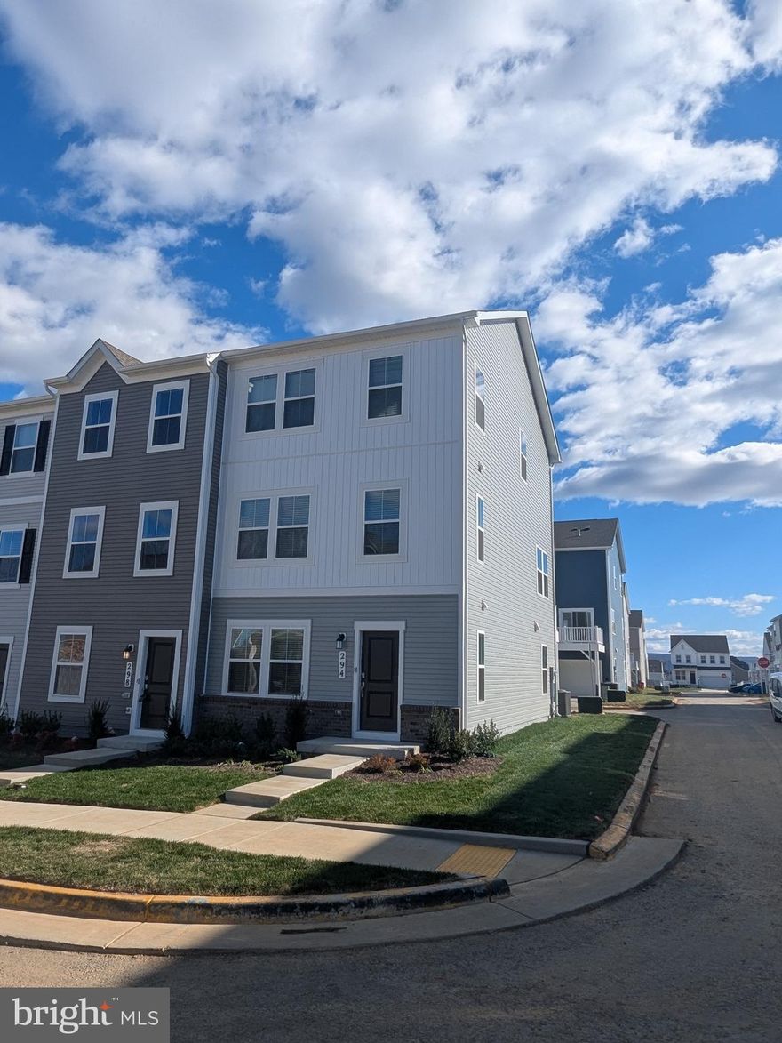 Brand New just built in 2025 and never lived in.  Be the first one to rent this end unit large 20' townhome.  Main level has entry, half bath, small family room area, and access to two car garage.  Main level has HUGE family room, another half bath, kitchen with large island, granite, stainless steel, pantry, dining area and access to large deck over driveway.  The upper level features three bedrooms, two baths, laundry, and linen.  Primary has walk in closet and large shower in primary bath along with double sinks.  Please use RentSpree to apply.  Pets on case by case basis.